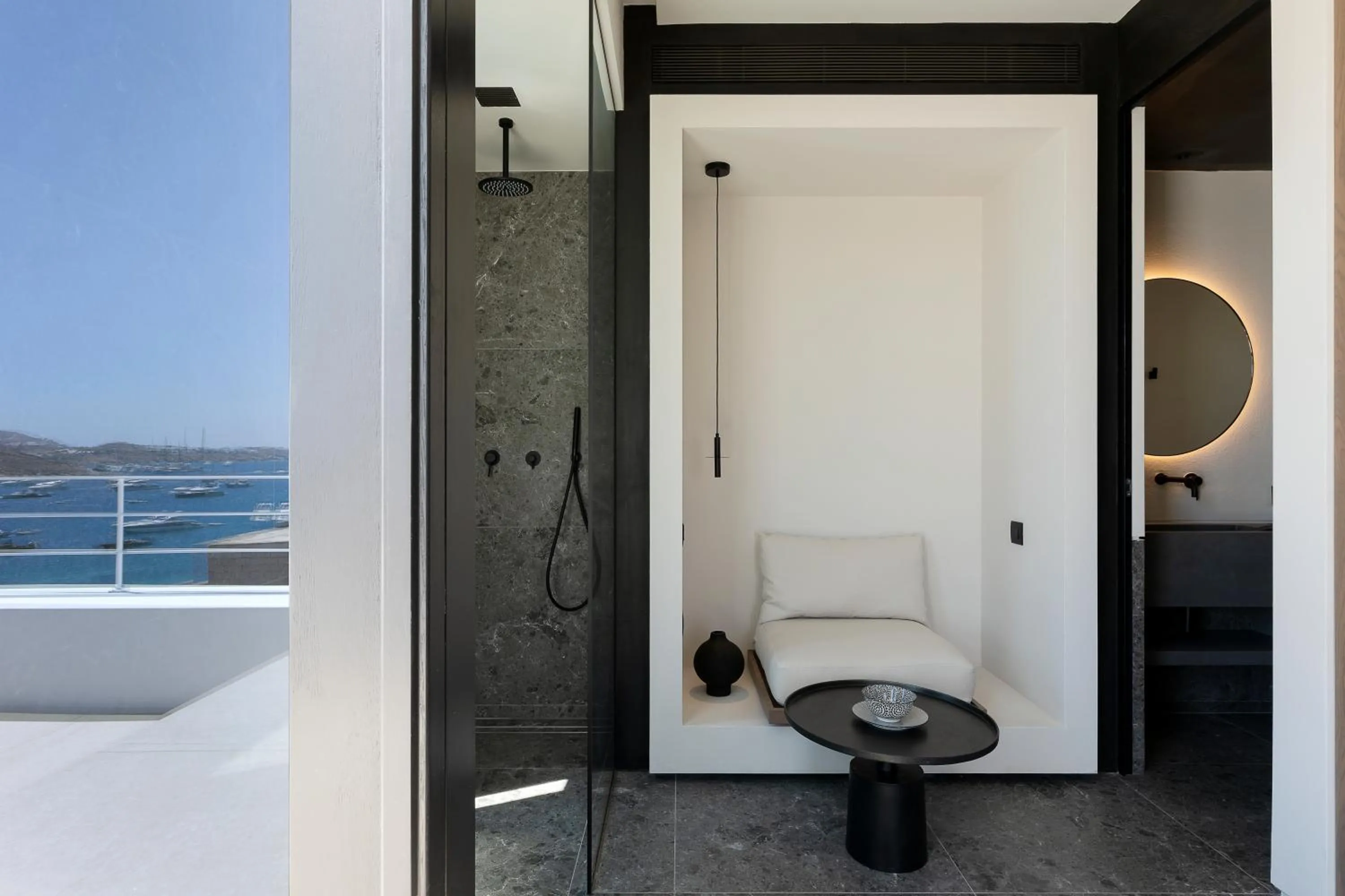 Seating area in CUBIC Mykonos Seafront Design Suites