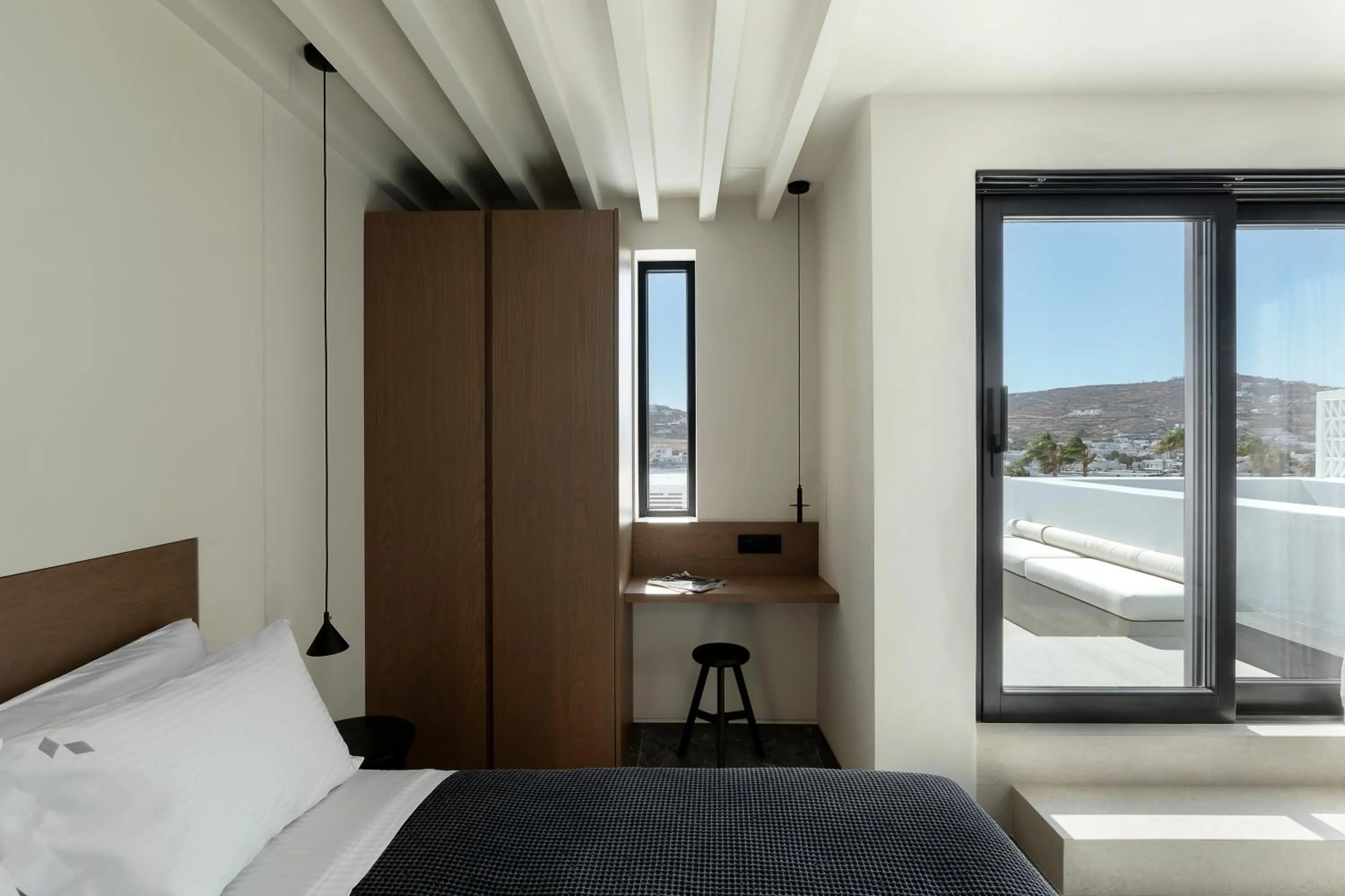 Bed in CUBIC Mykonos Seafront Design Suites