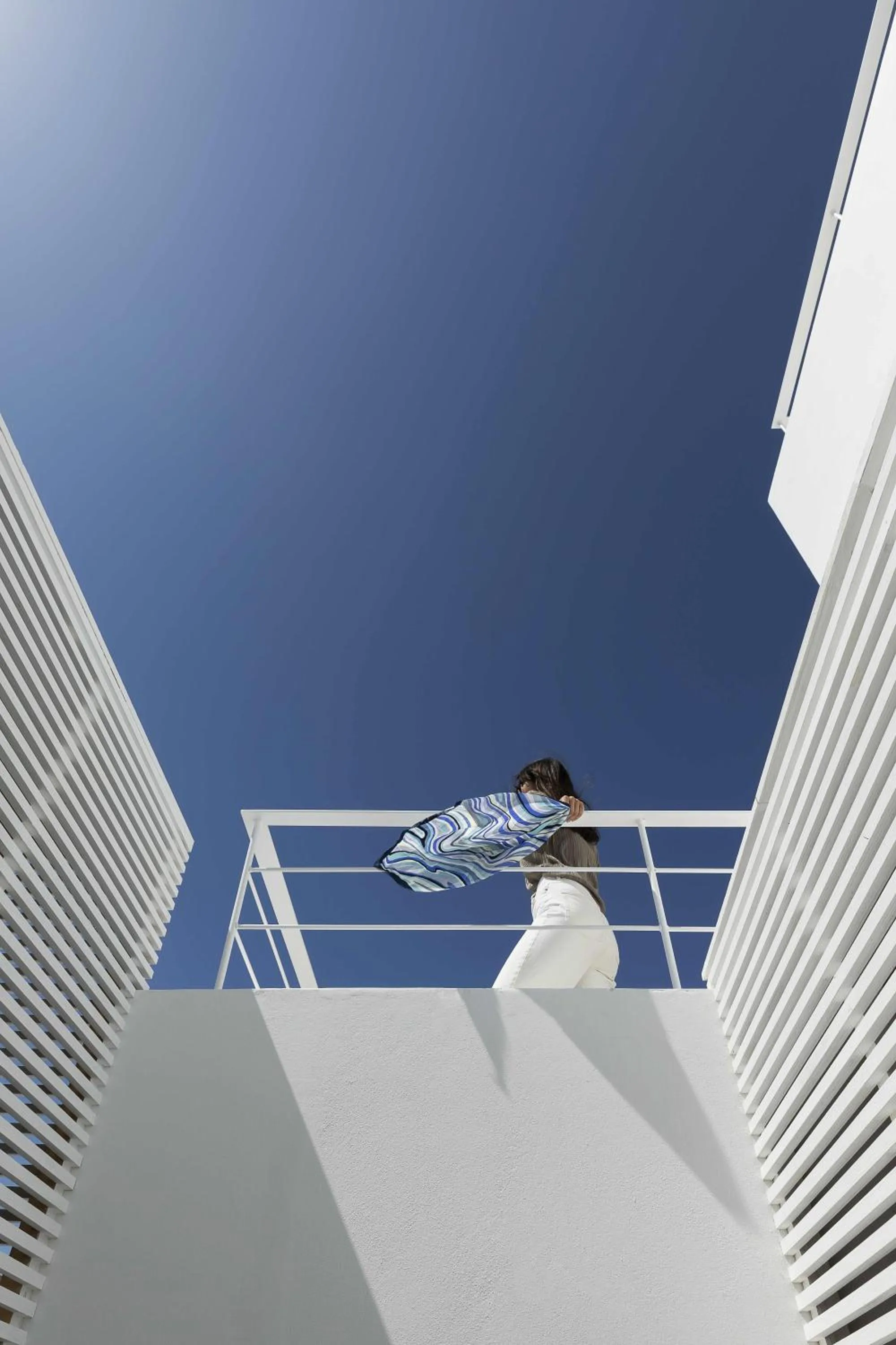 People in CUBIC Mykonos Seafront Design Suites