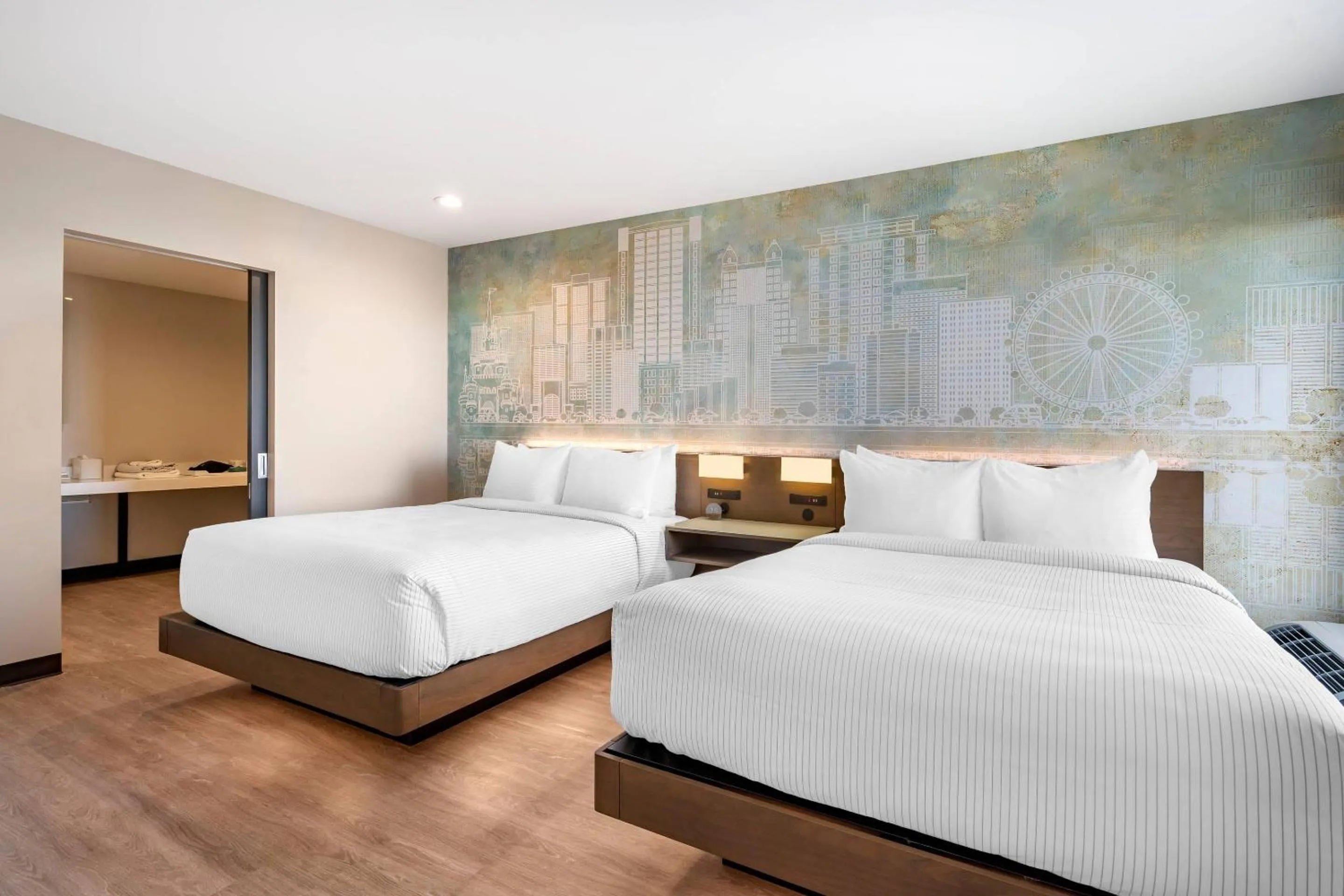 Bedroom, Bed in Cambria Hotel Orlando near Universal Theme Parks