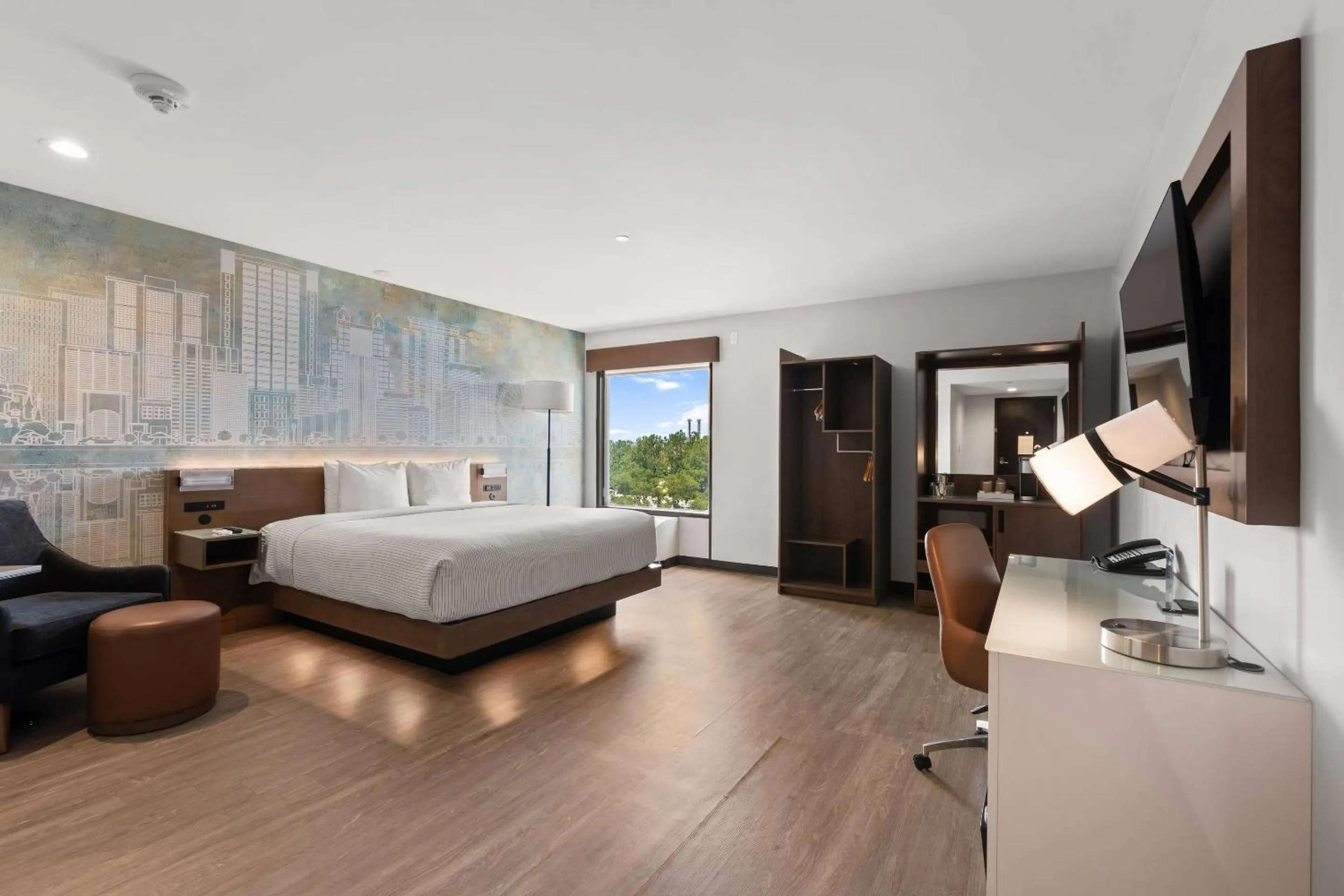 Bedroom, Bed in Cambria Hotel Orlando near Universal Theme Parks