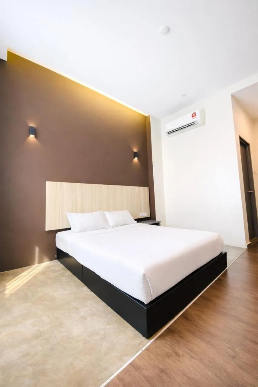 Bed in KARANG TIMUR Hotel