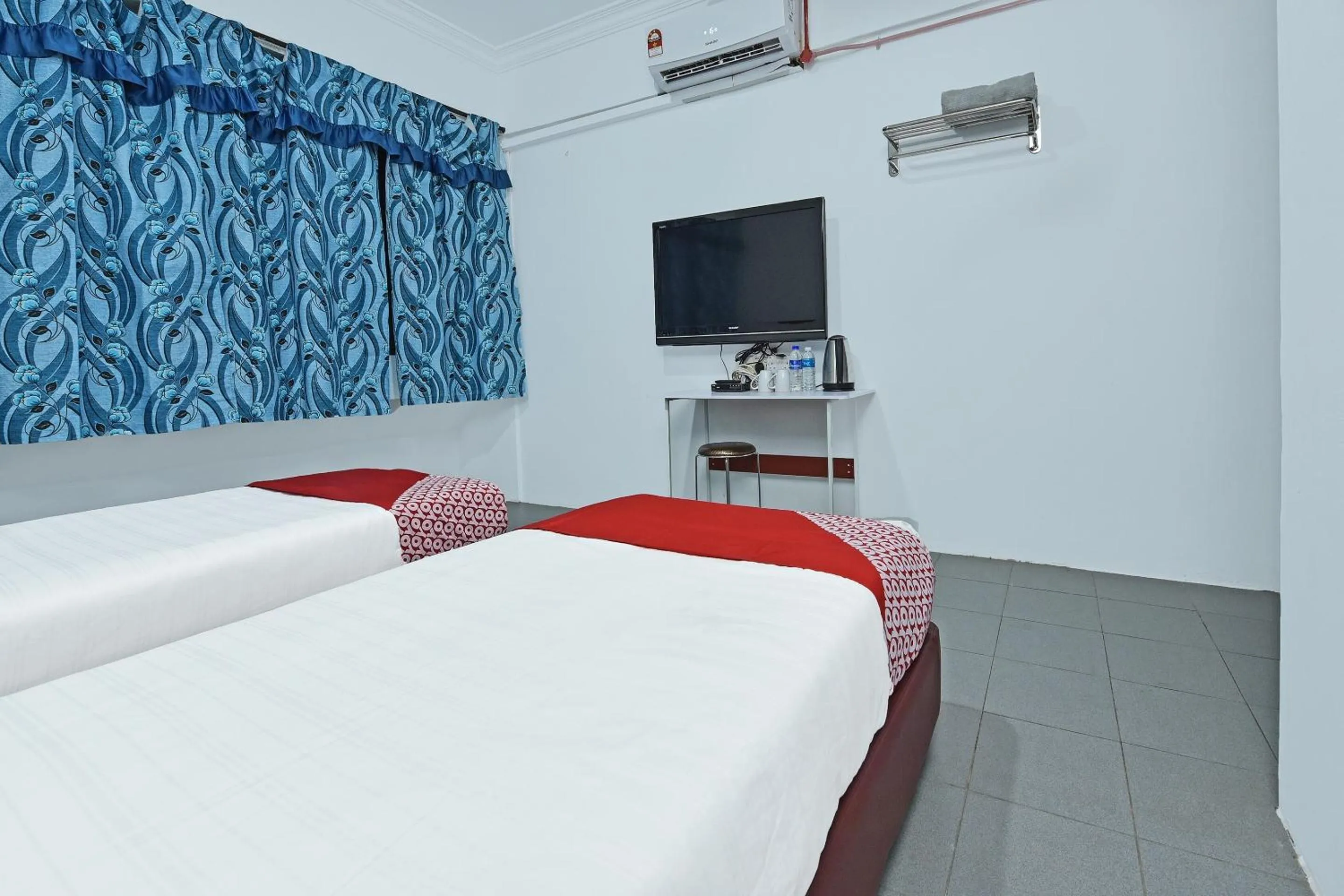 Bedroom in OYO 90544 M&h Hotel