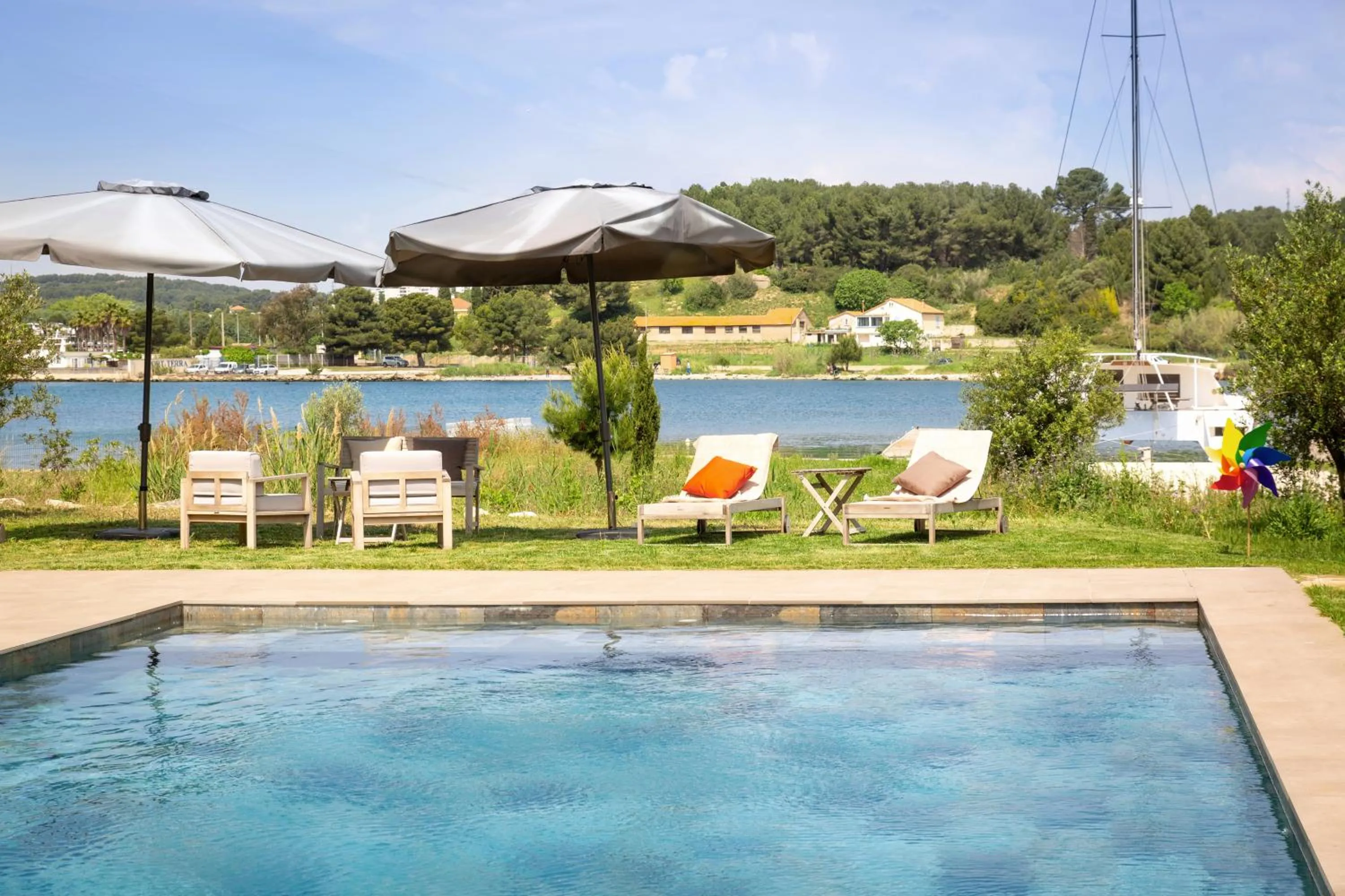 Swimming pool in Golden Tulip Hotel & Rooftop Martigues Provence