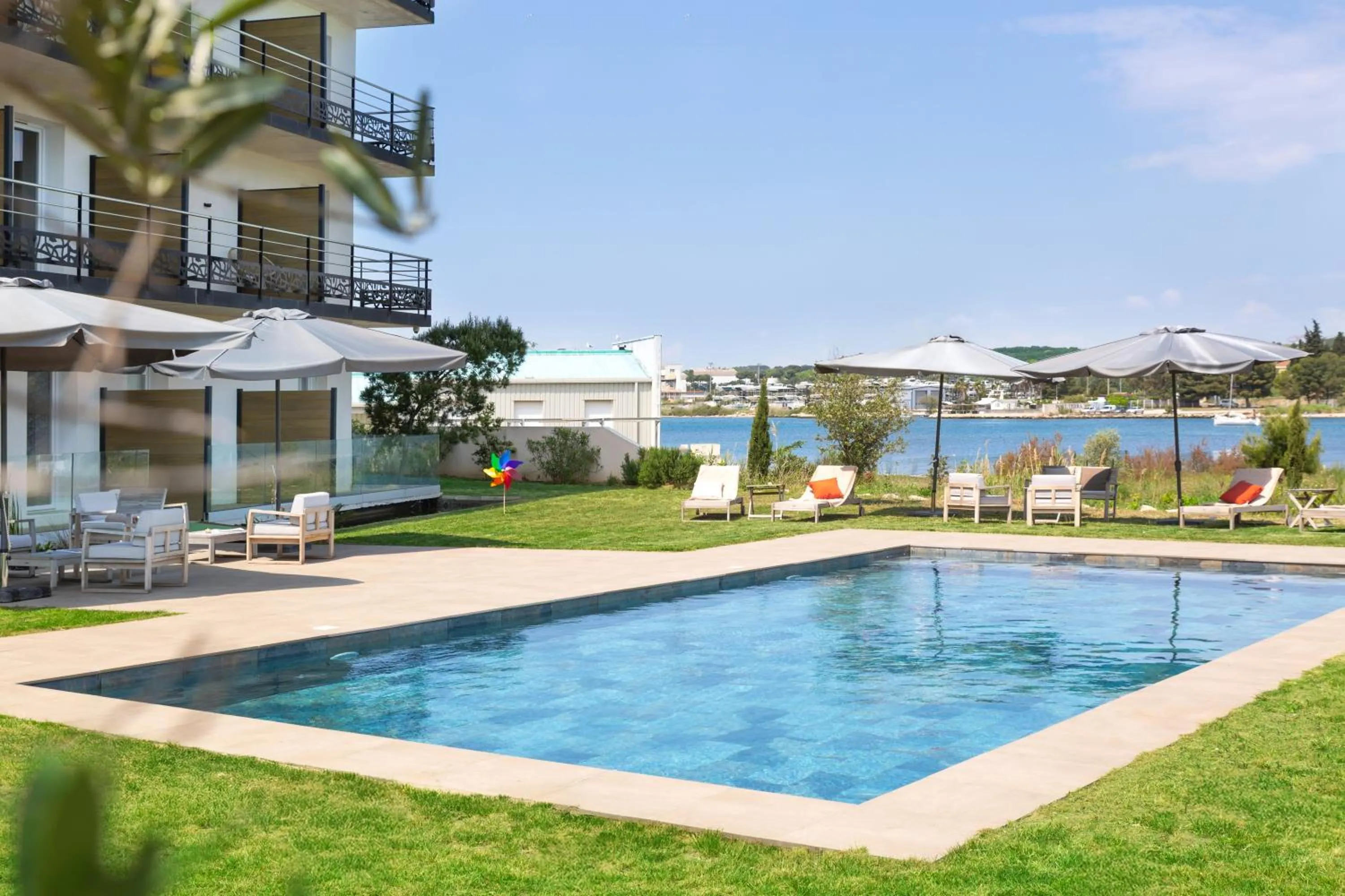 Swimming pool in Golden Tulip Hotel & Rooftop Martigues Provence