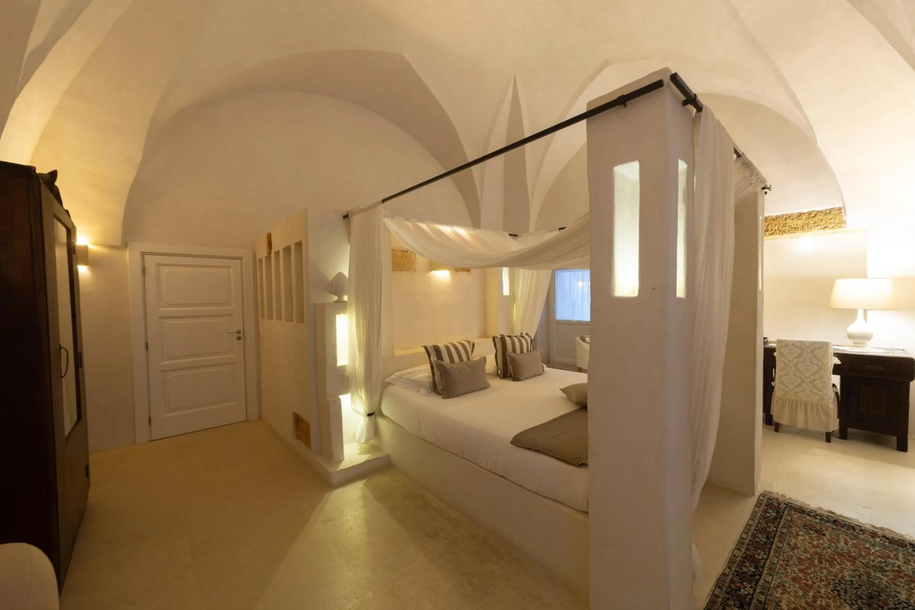 Bed in Masseria Messapia Wine Resort & Spa Salento
