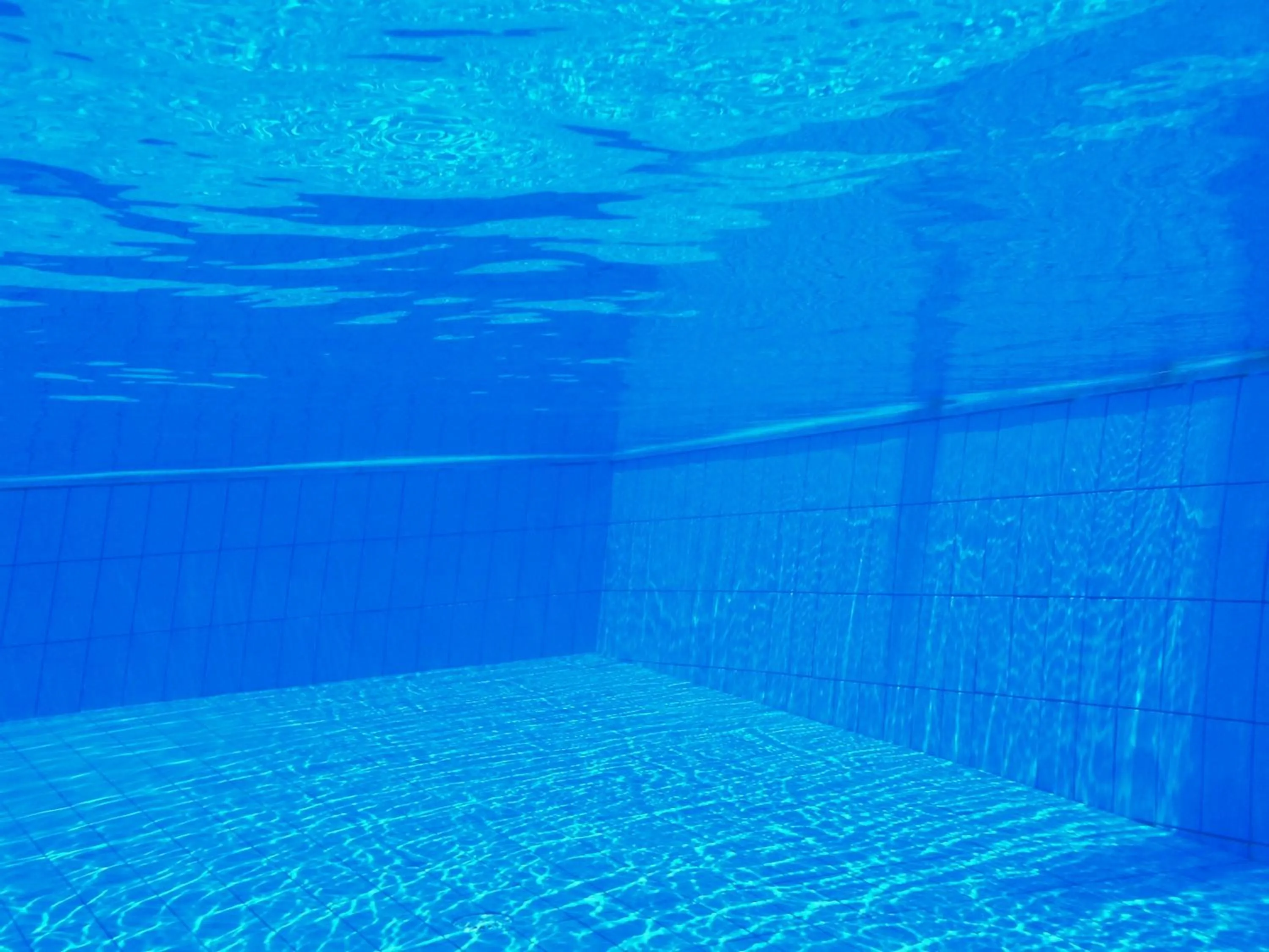 Swimming pool in Captains Studios & Apartments