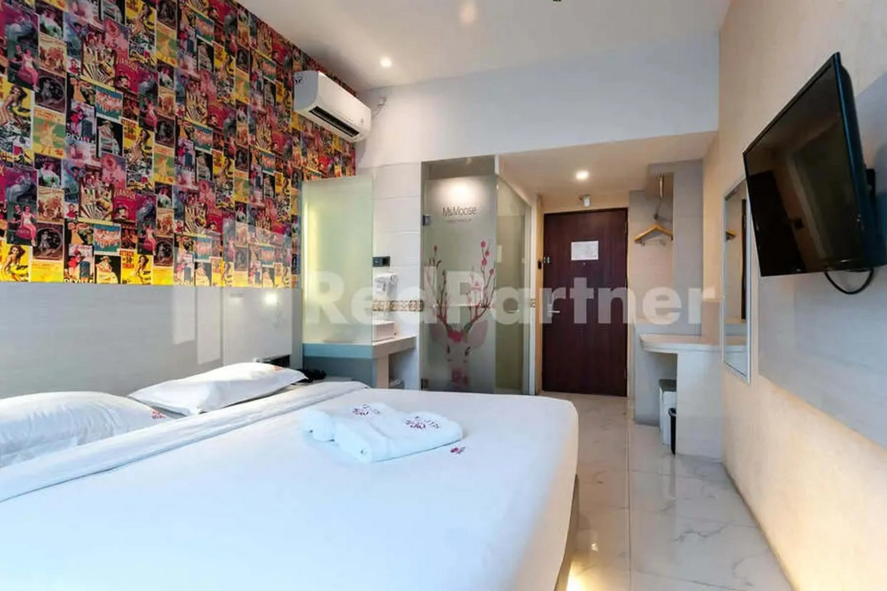 Bedroom, Bed in Selecta Hotel Medan Petisah R Signature Mitra RedDoorz