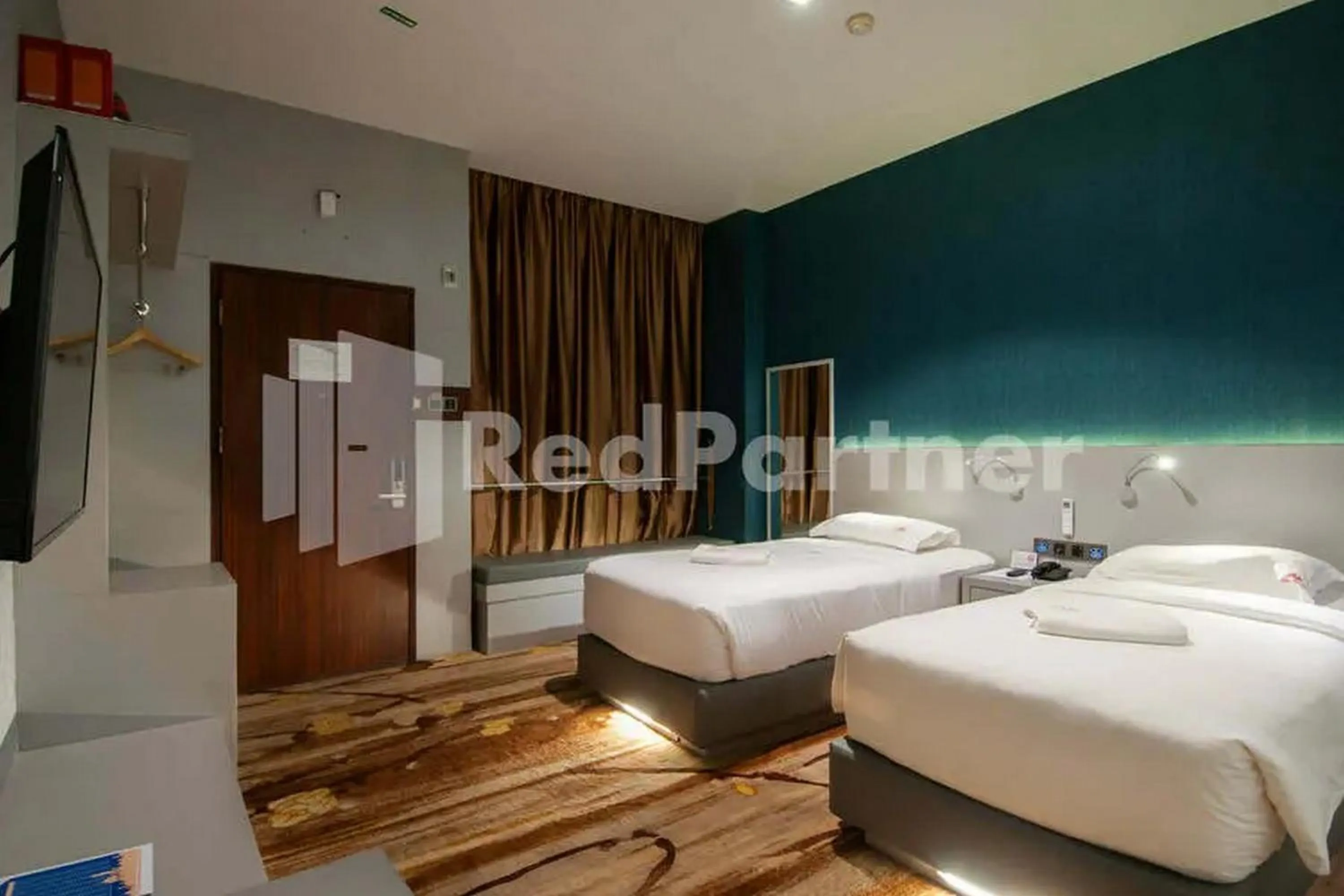 Bedroom, Bed in Selecta Hotel Medan Petisah R Signature Mitra RedDoorz