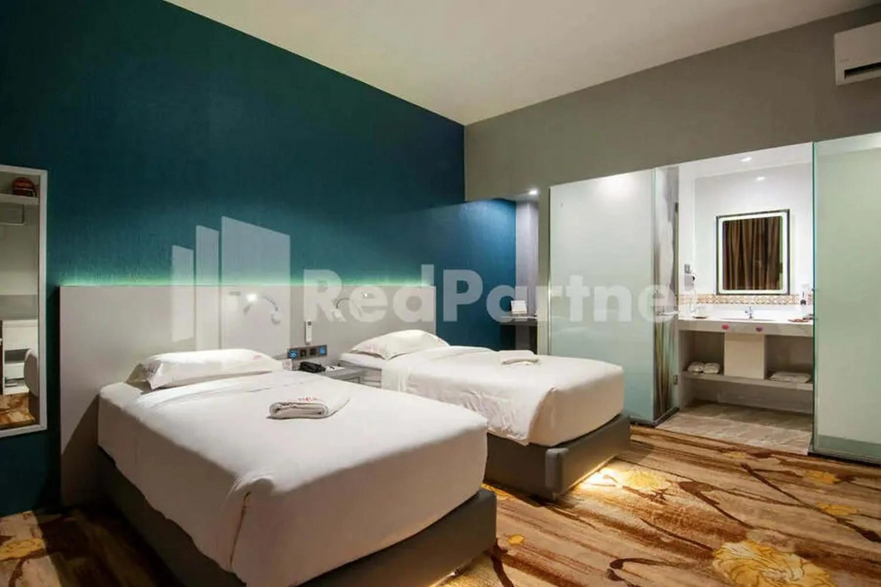 Bedroom, Bed in Selecta Hotel Medan Petisah R Signature Mitra RedDoorz