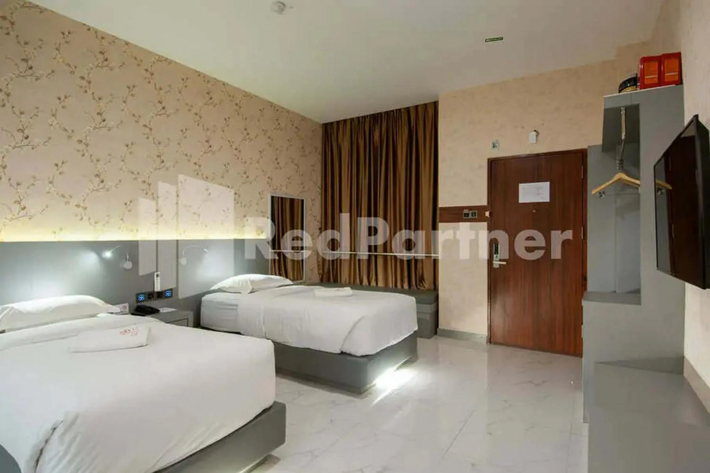 Bedroom, Bed in Selecta Hotel Medan Petisah R Signature Mitra RedDoorz