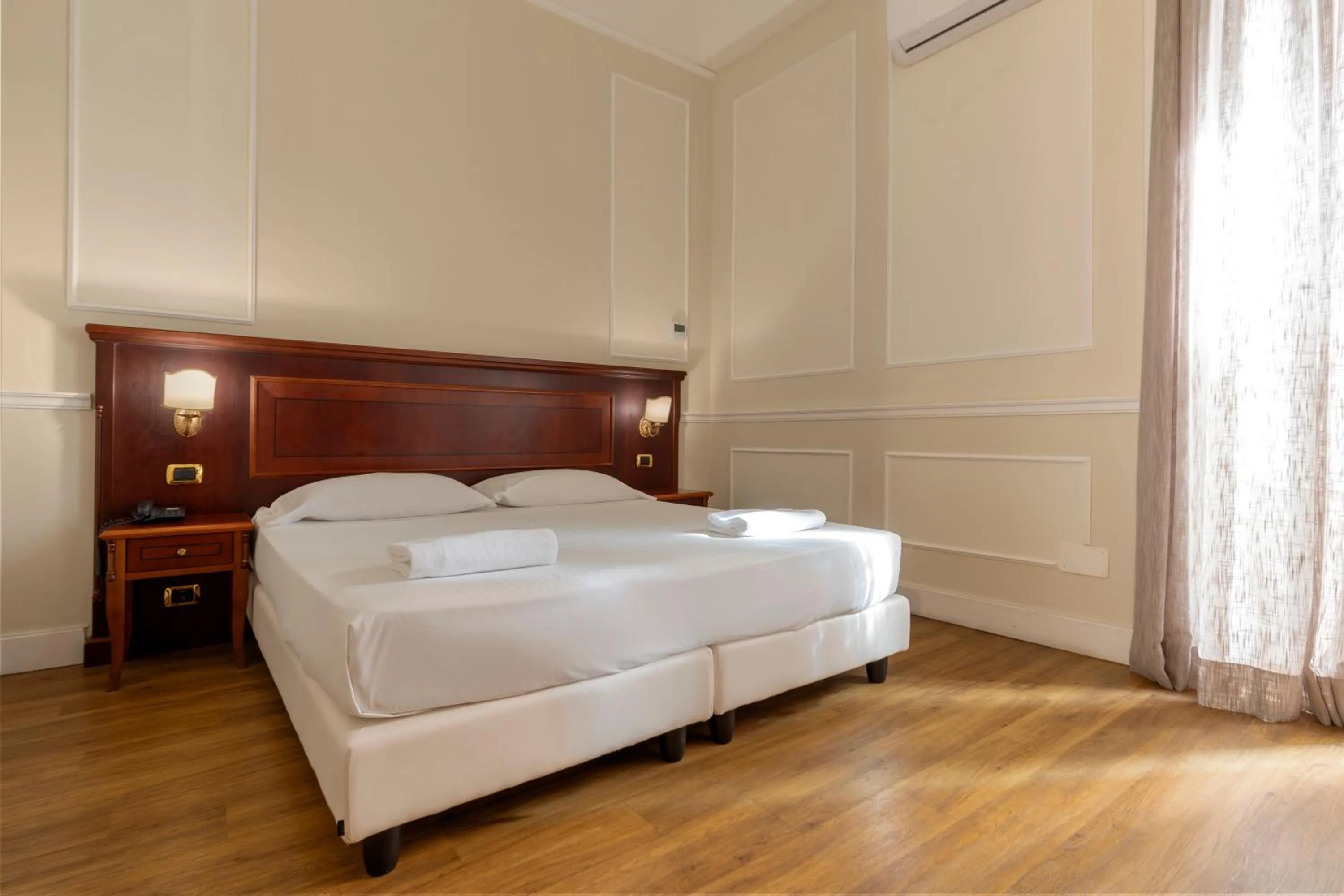 Bed in Napolit'amo Hotel Principe