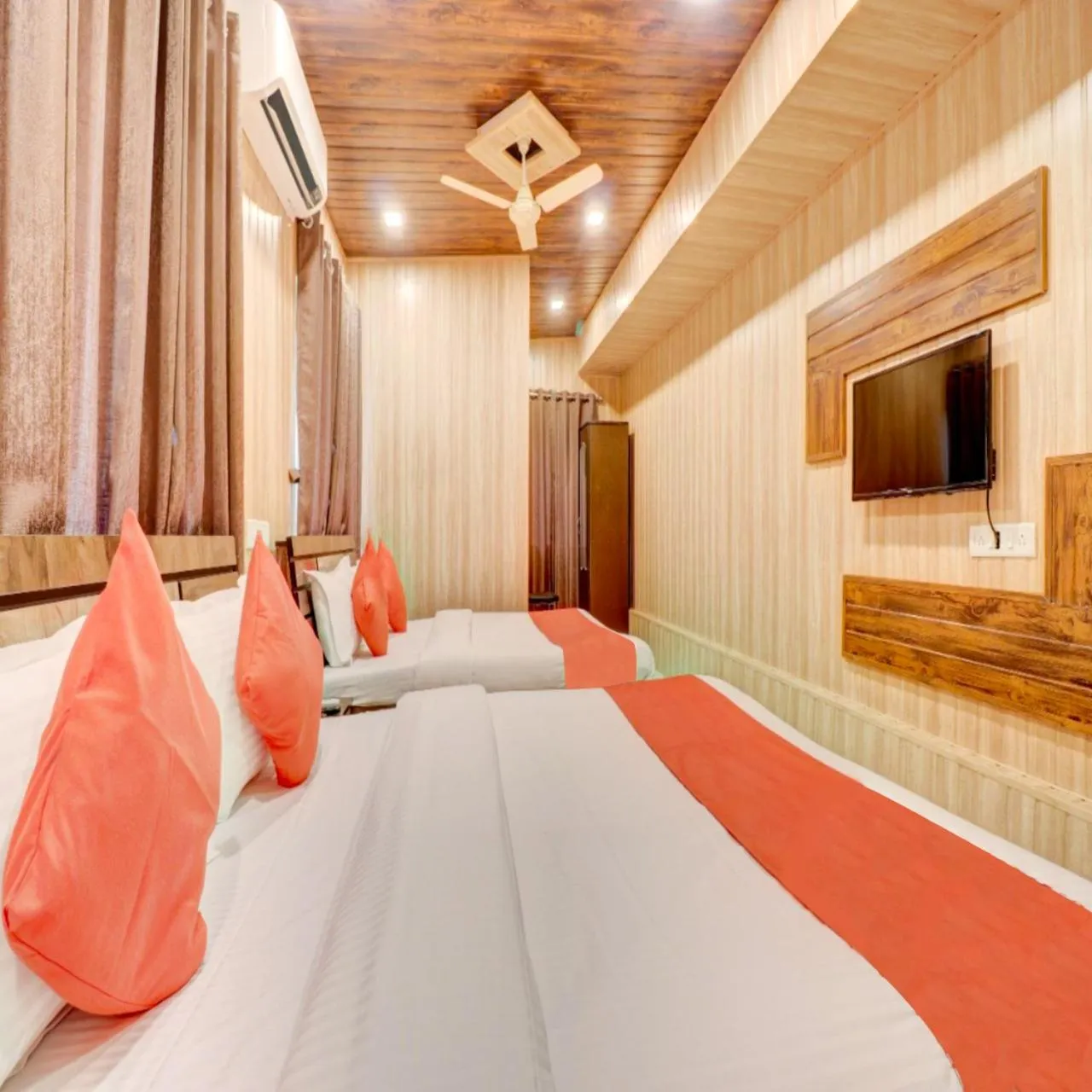 TV and multimedia, Bed in Hotel Snehaprabha - Near to Nagaon Beach Alibaug