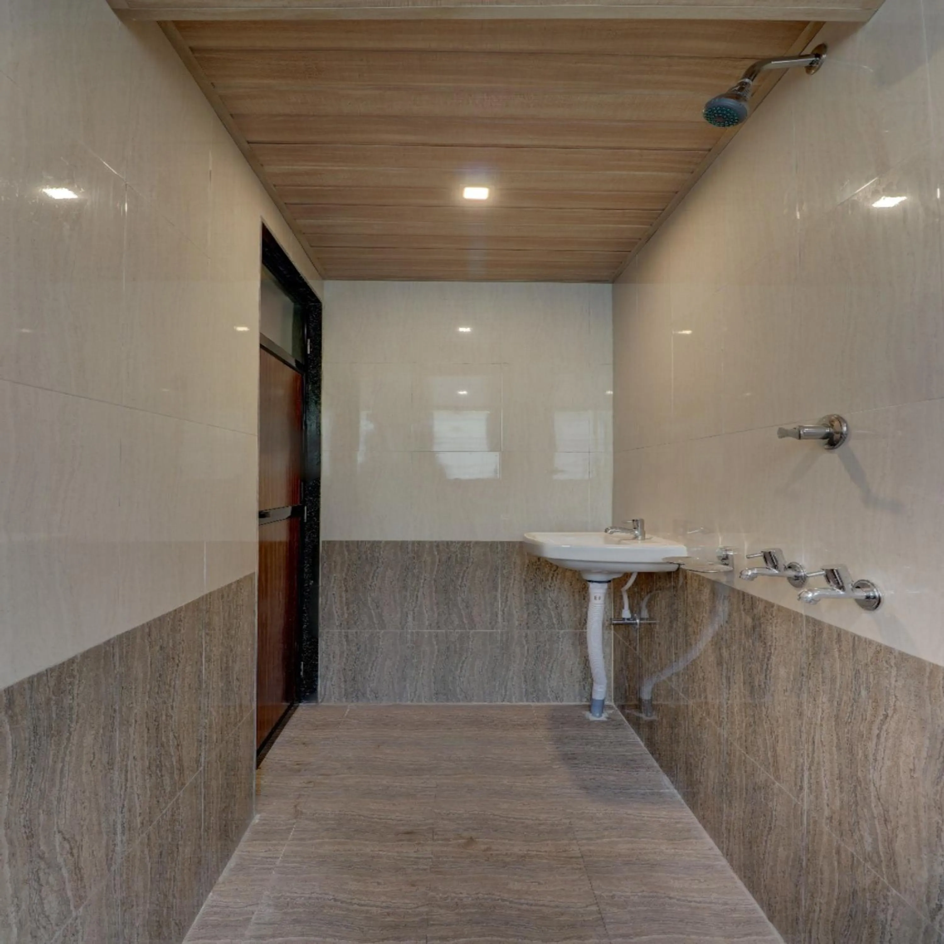 Bathroom in Hotel Snehaprabha - Near to Nagaon Beach Alibaug