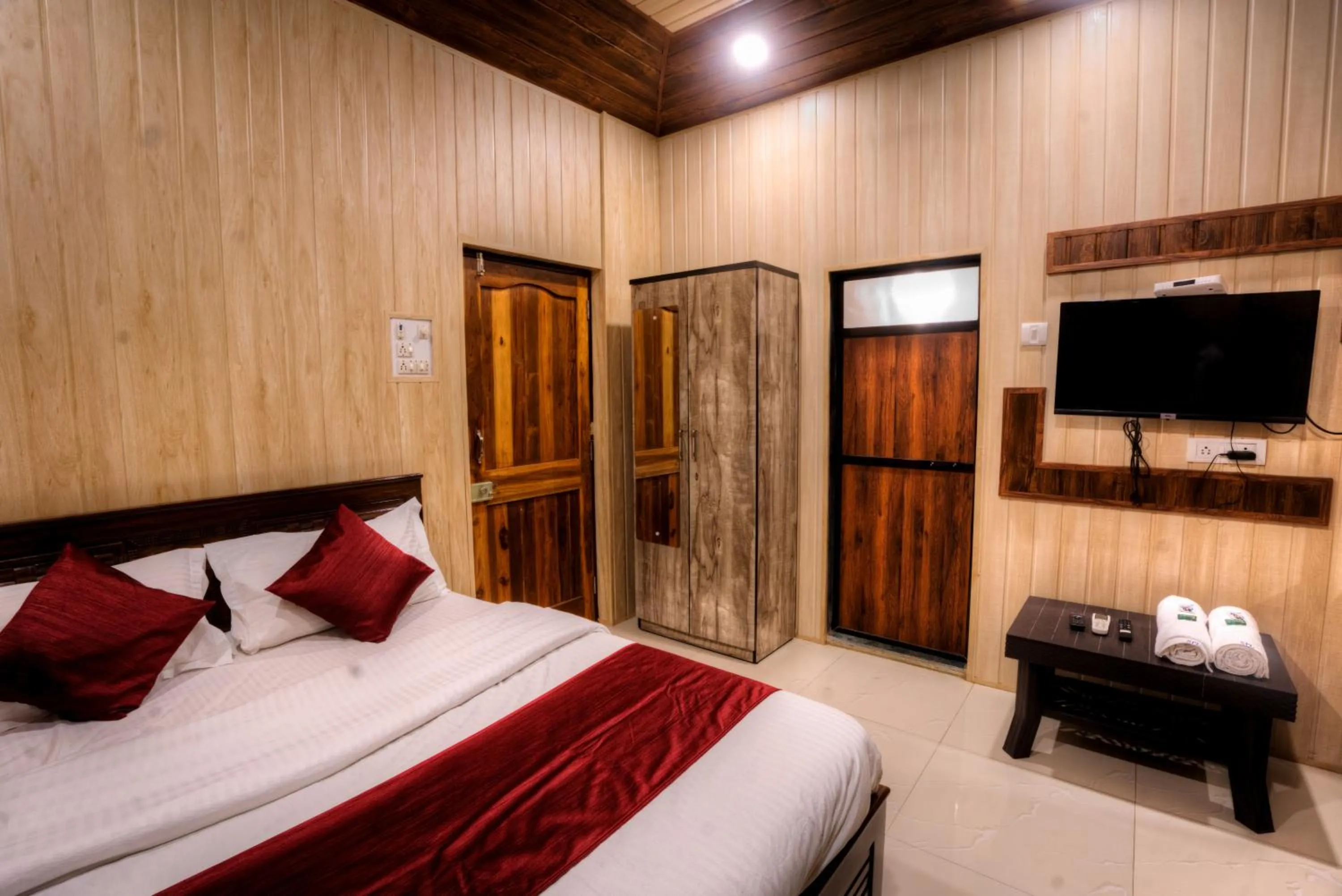 Photo of the whole room, Bed in Hotel Snehaprabha - Near to Nagaon Beach Alibaug