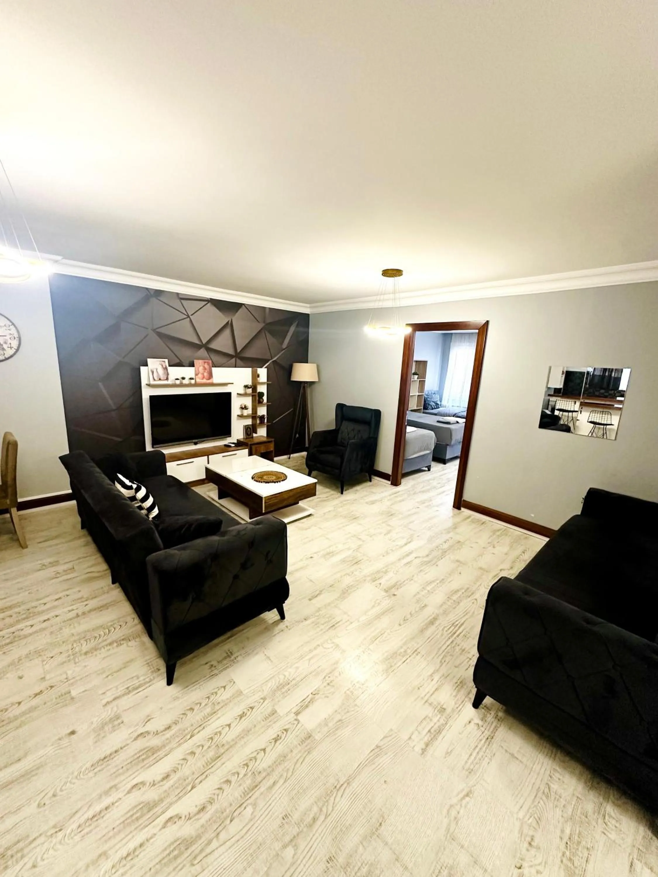 Communal lounge/ TV room in Blueway Hotel Residence