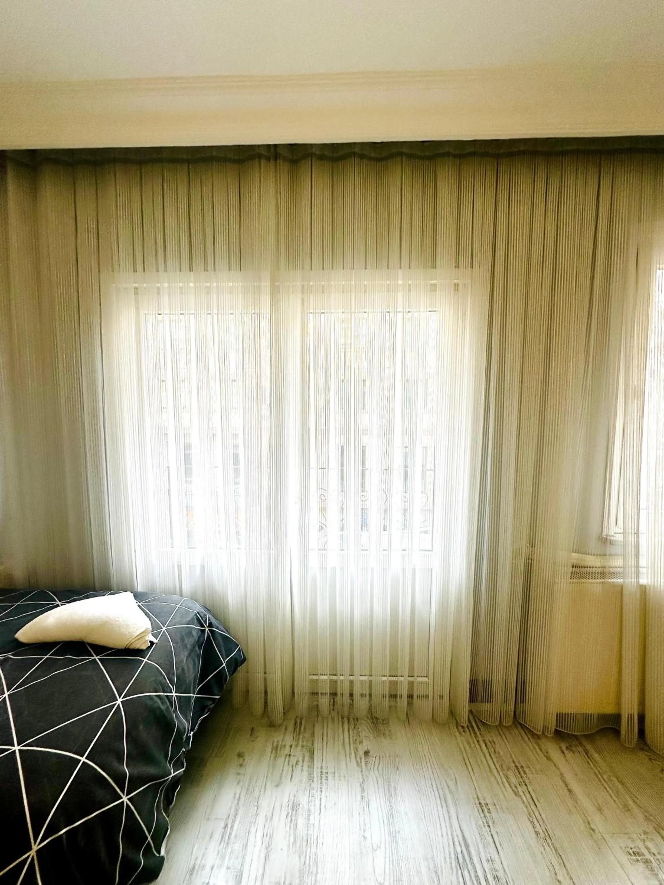 Bed in Blueway Hotel Residence