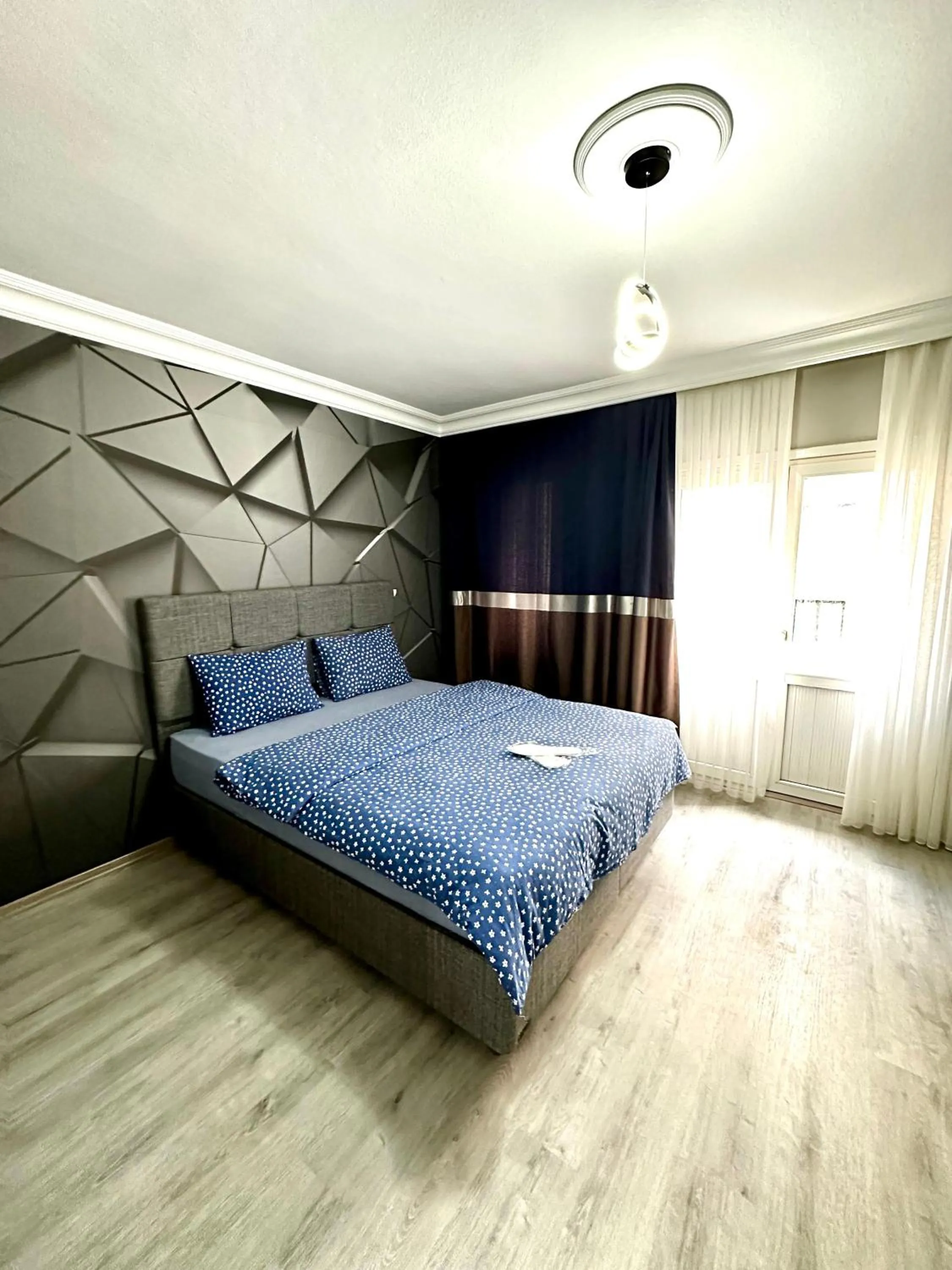 Bed in Blueway Hotel Residence