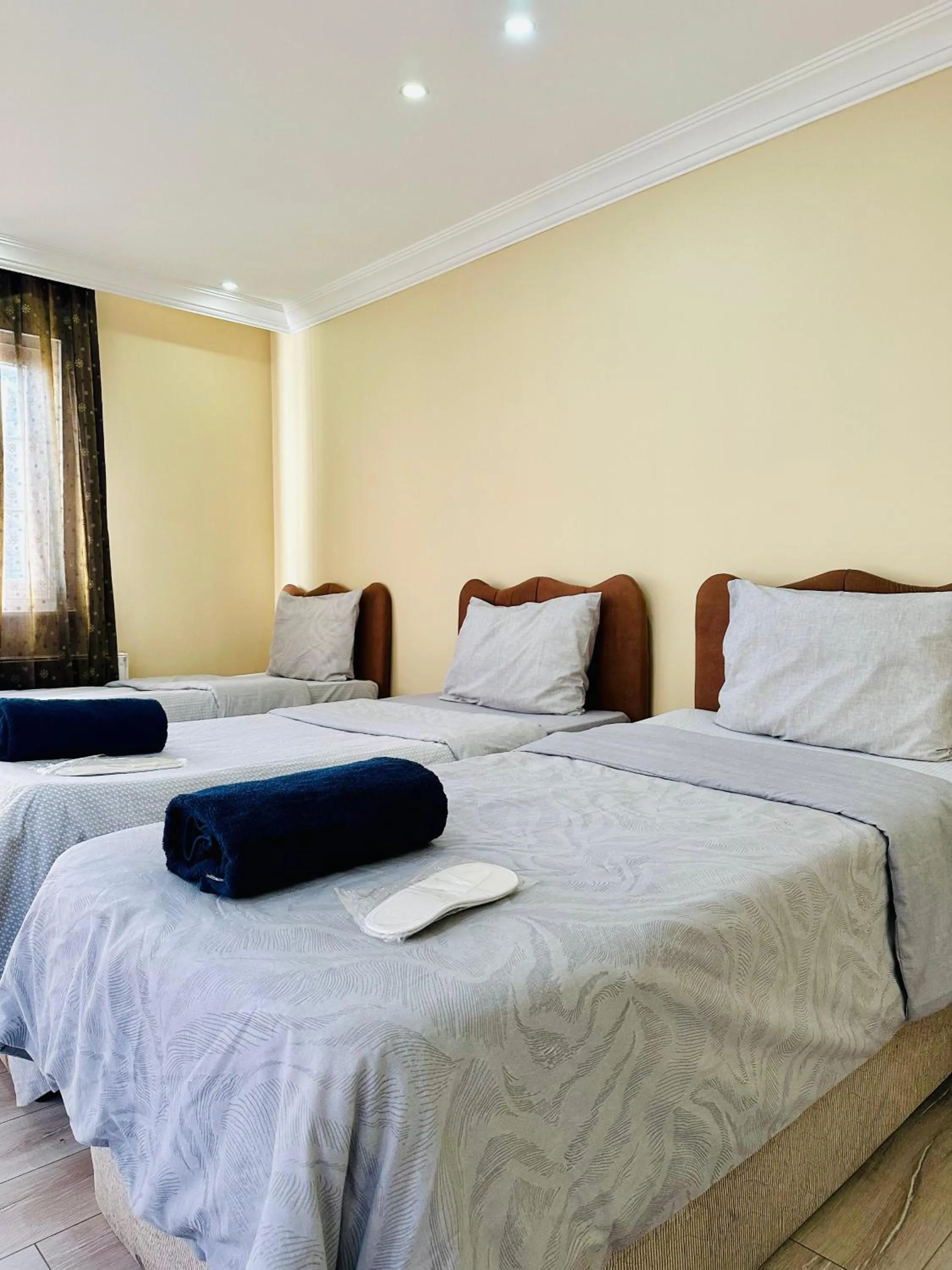 Bed in Blueway Hotel Residence