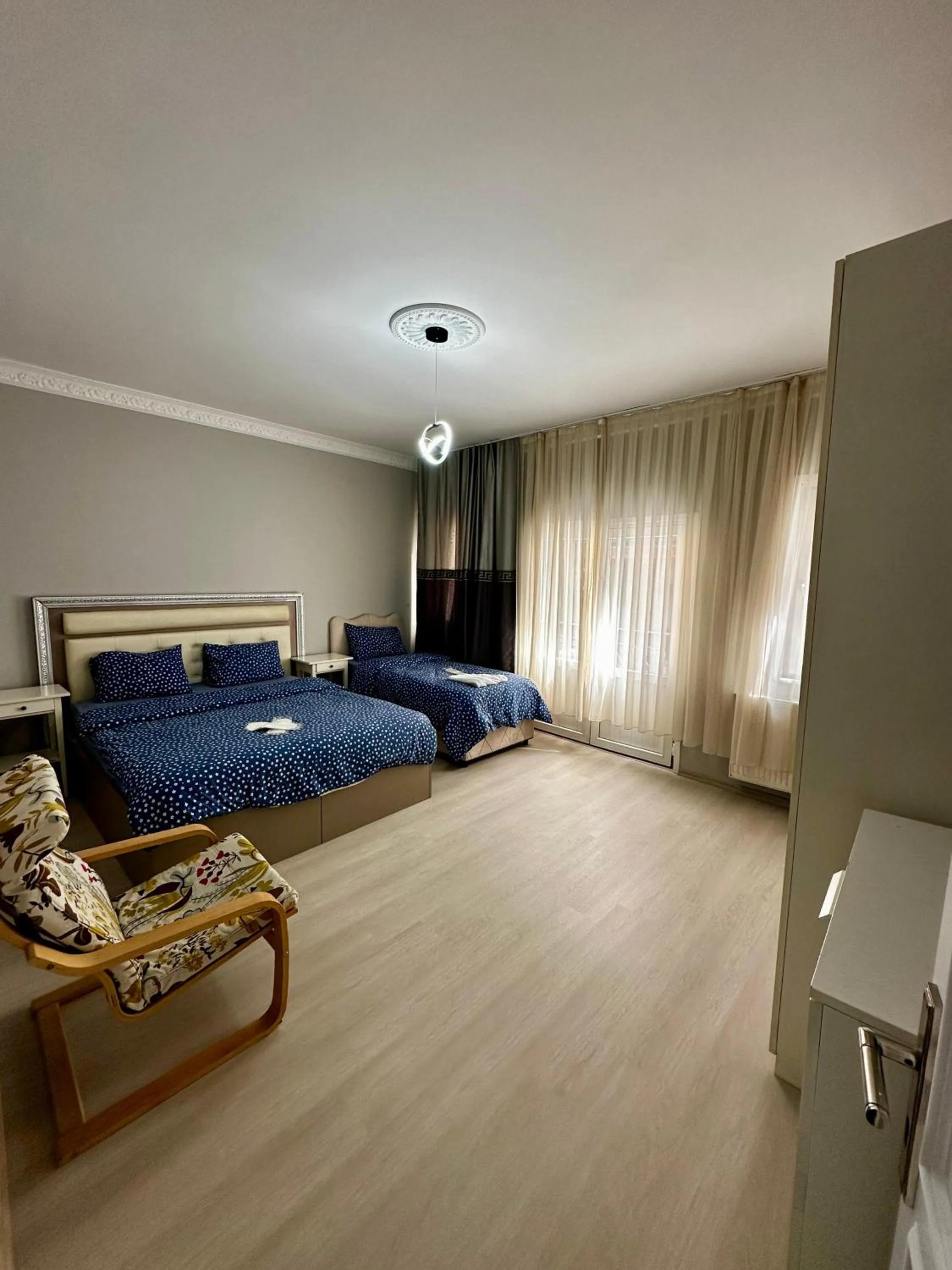 Bed in Blueway Hotel Residence