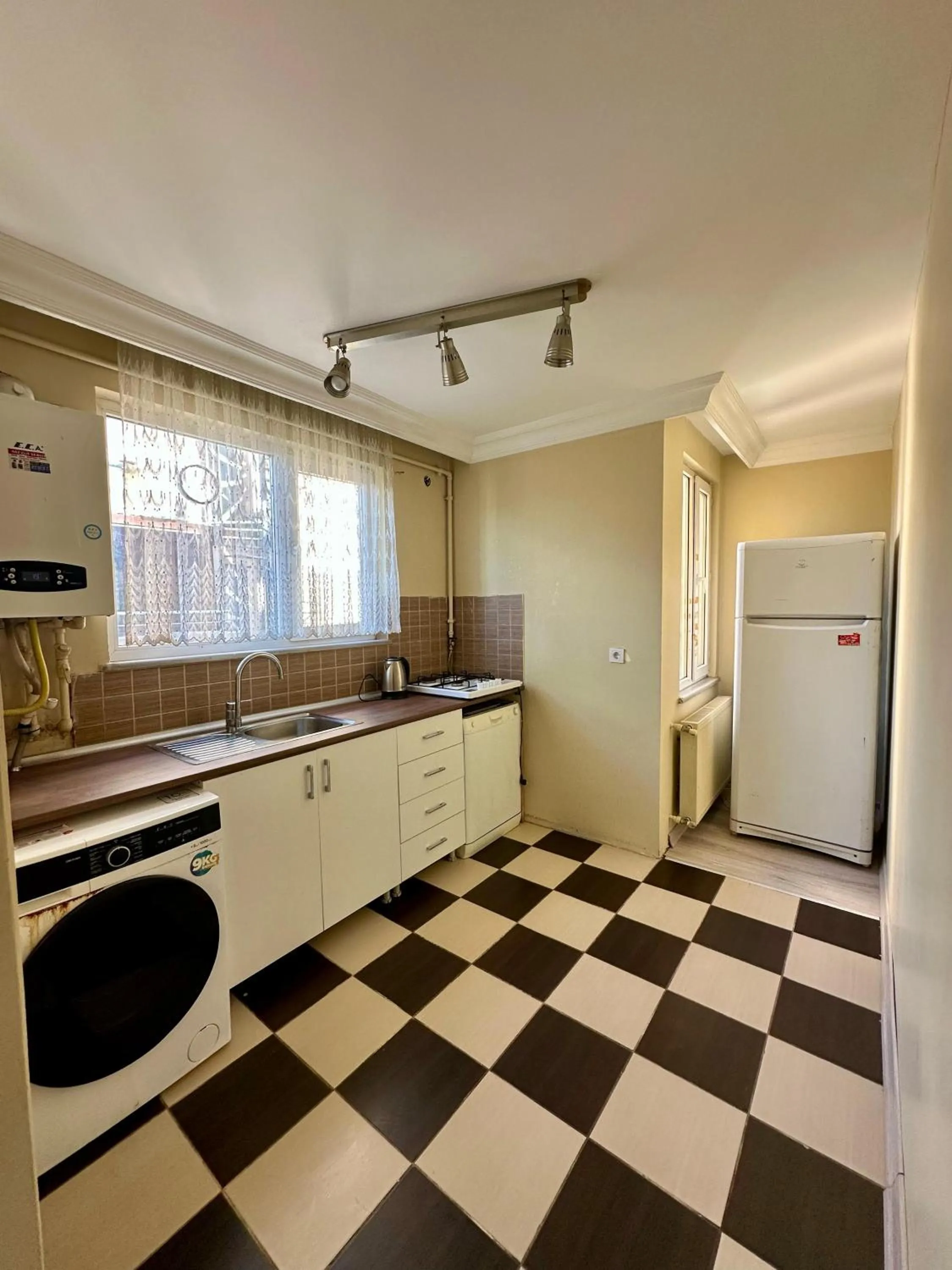 Kitchen or kitchenette in Blueway Hotel Residence