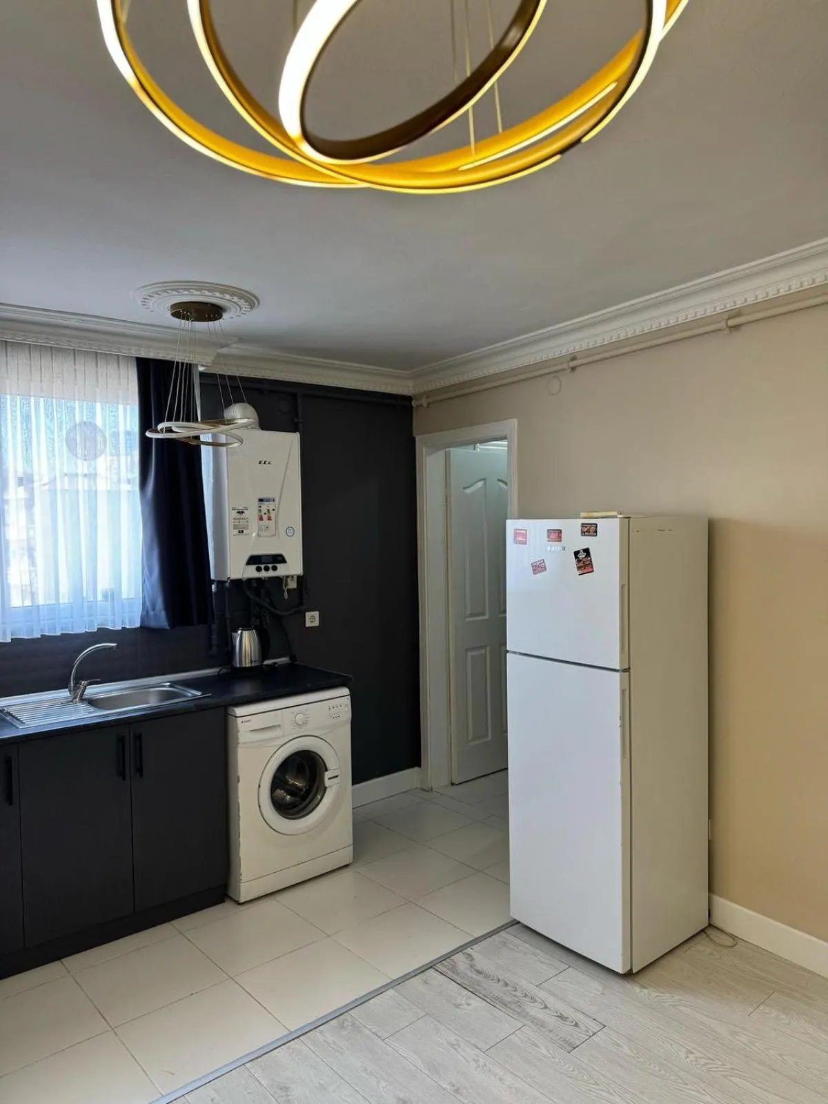 Kitchen or kitchenette in Blueway Hotel Residence