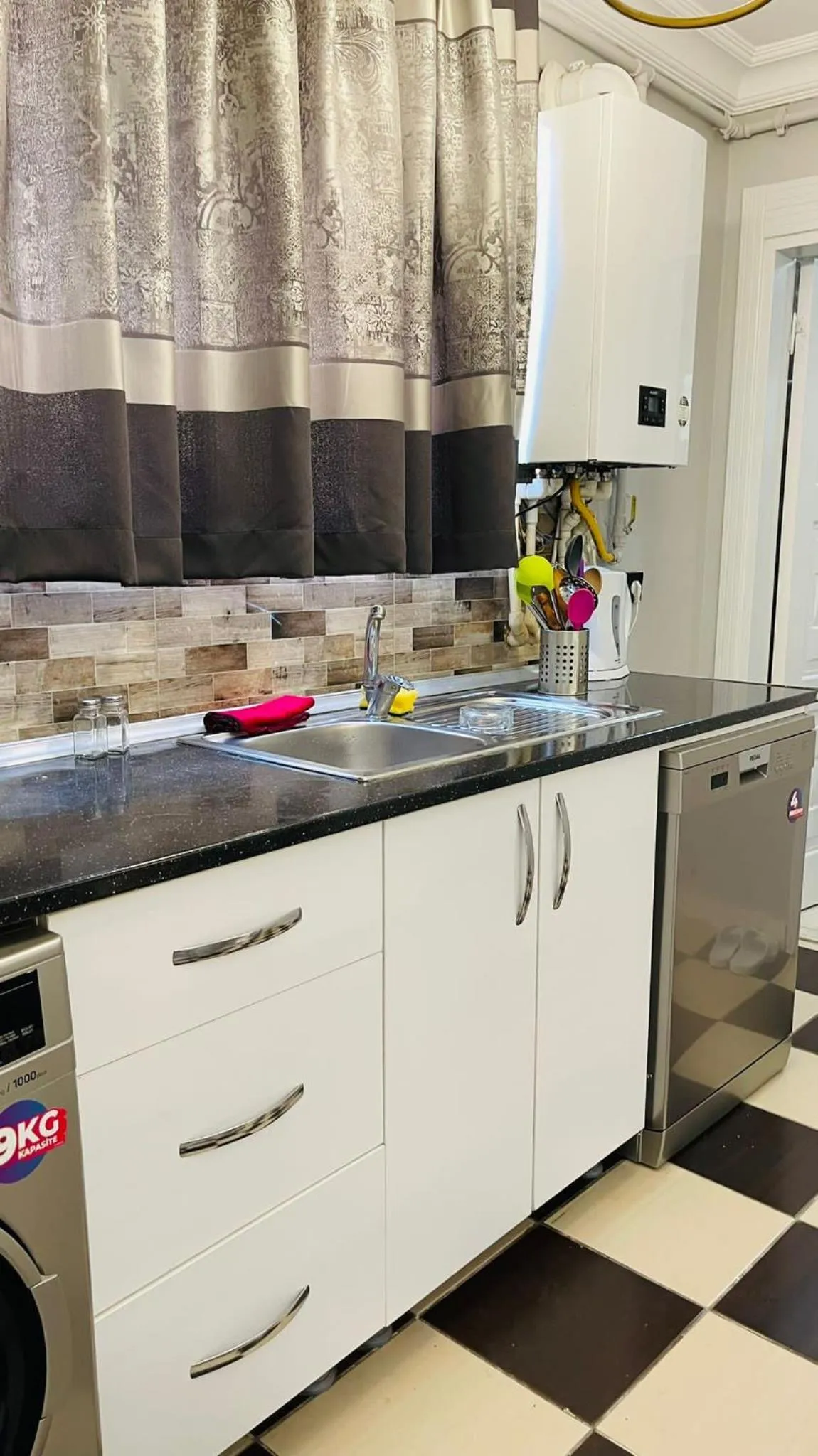 dishwasher in Blueway Hotel Residence