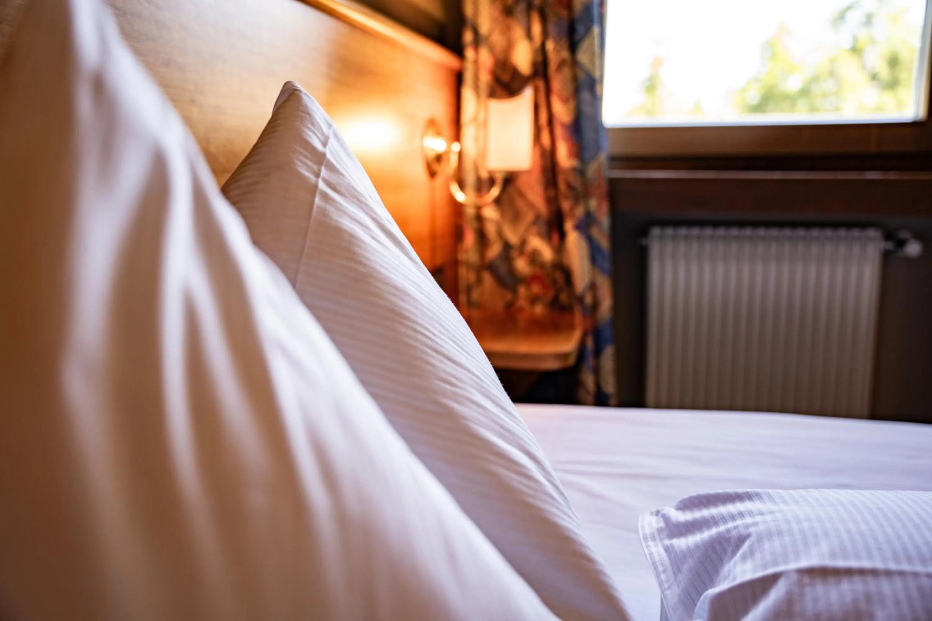 Bed in PanoramaHotel Penegal