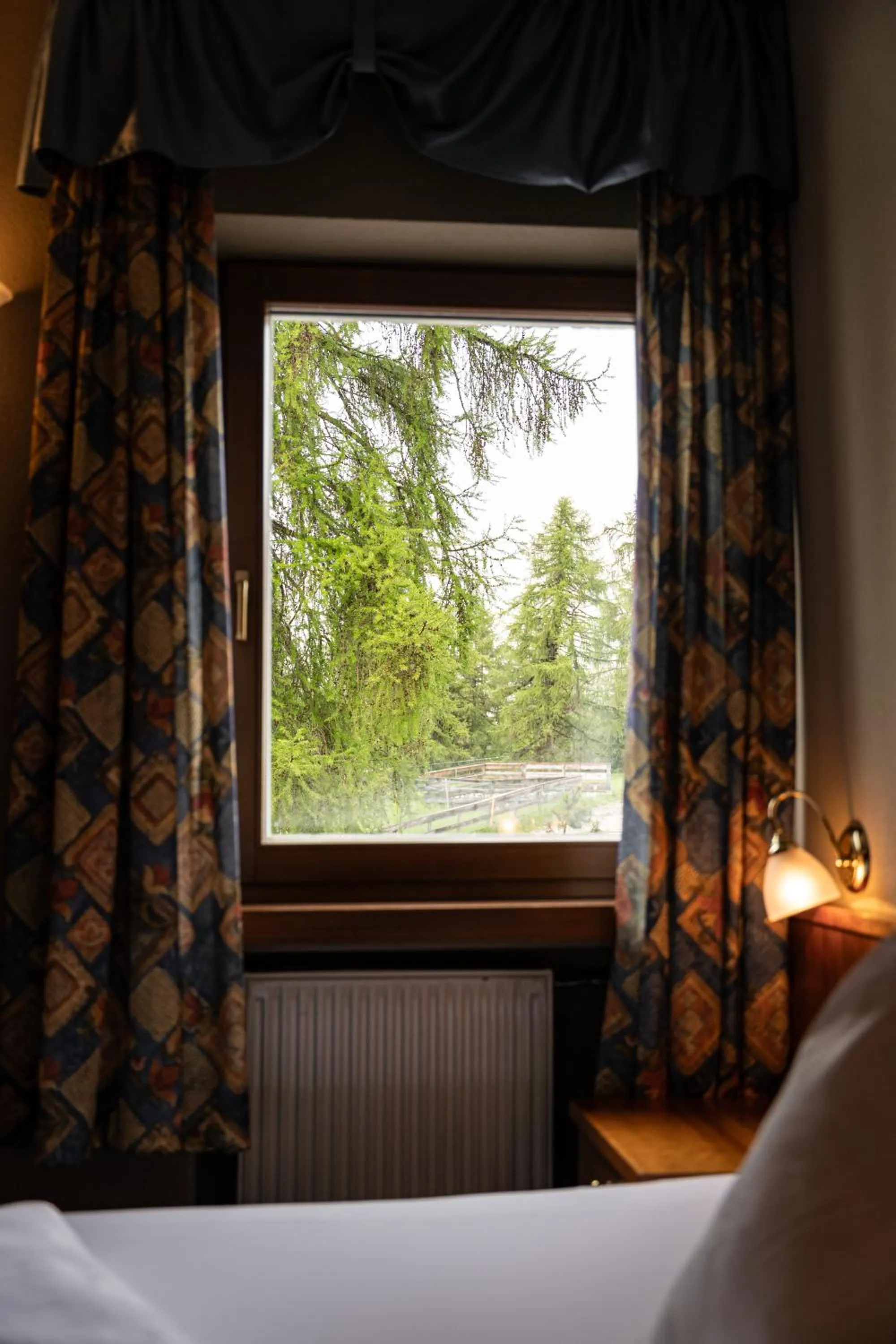 Quiet street view, Bed in PanoramaHotel Penegal