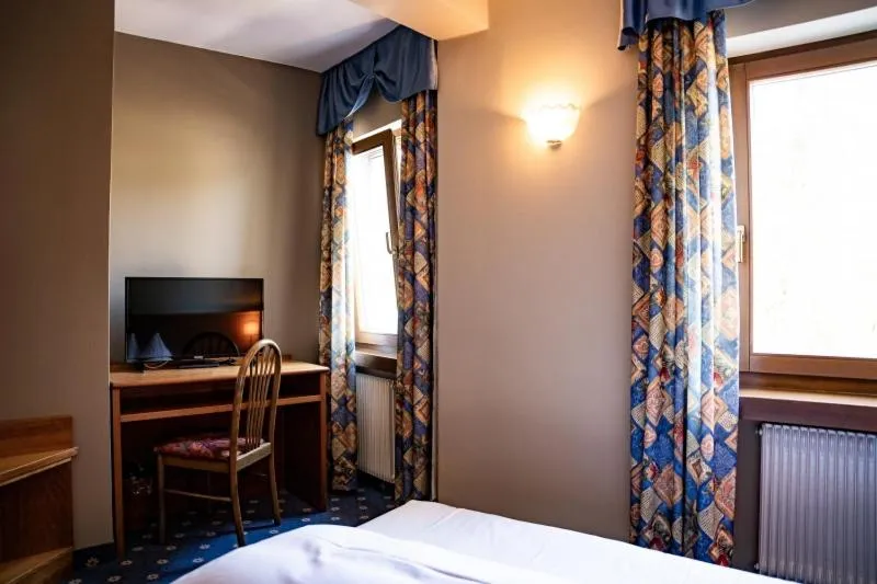 TV and multimedia, Bed in PanoramaHotel Penegal