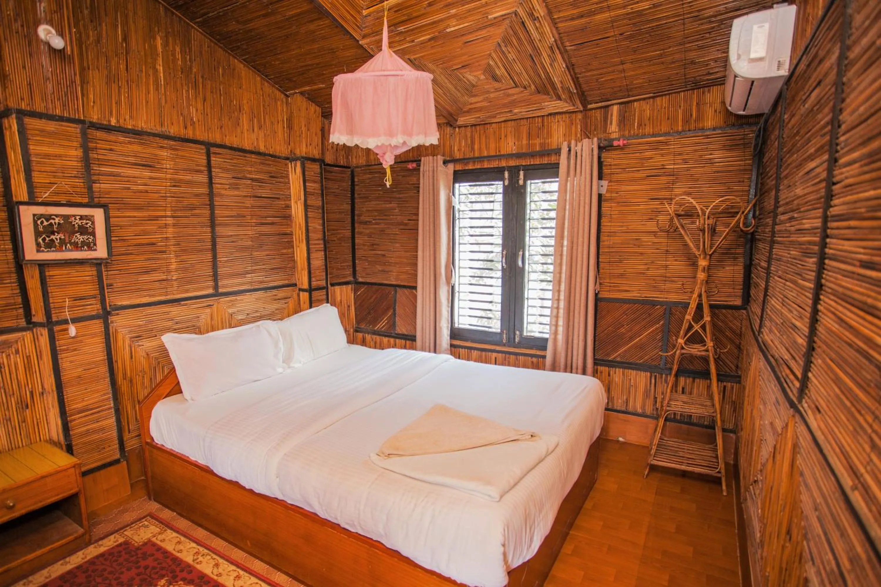Bed in Chitwan Tiger Camp
