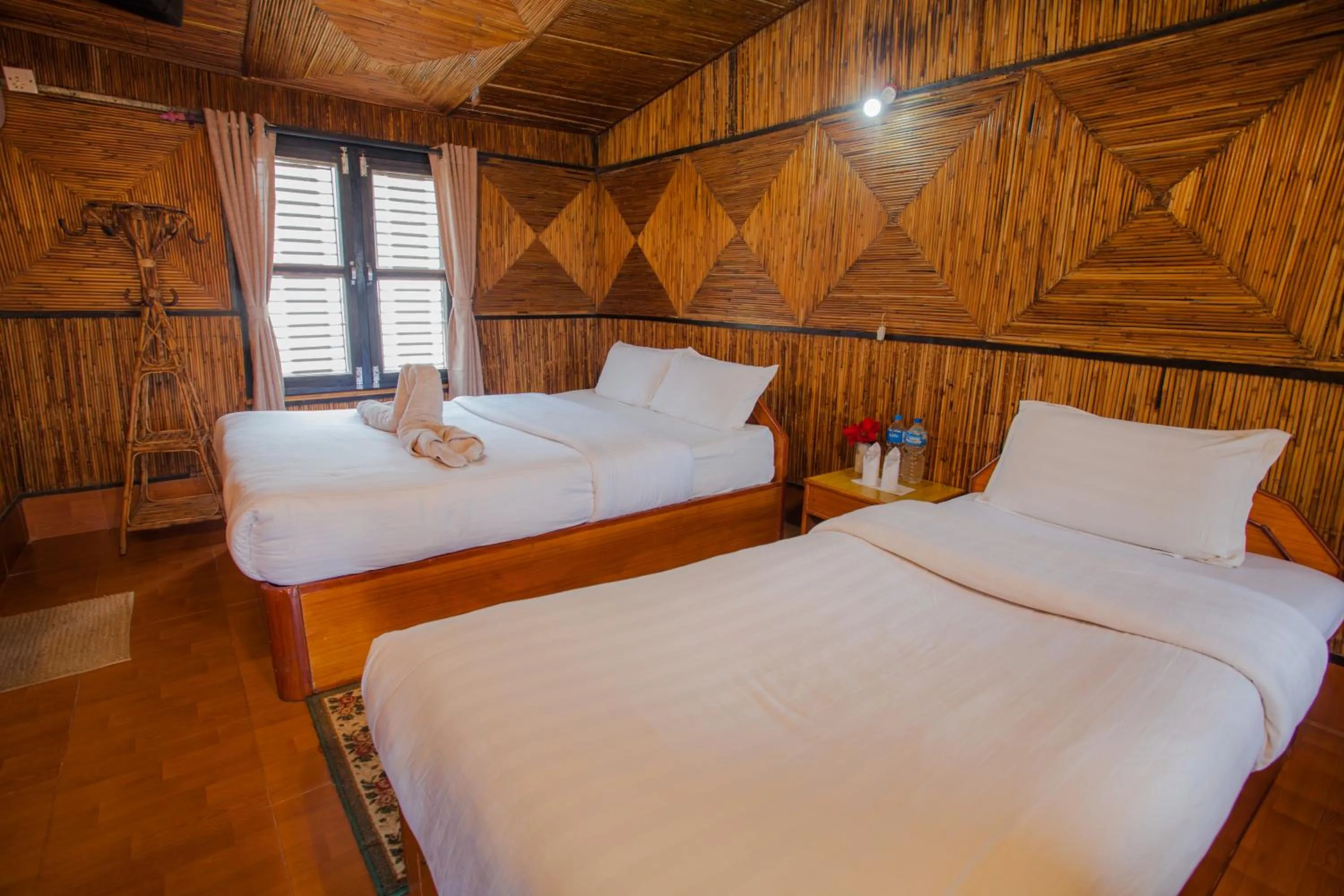 Bed in Chitwan Tiger Camp