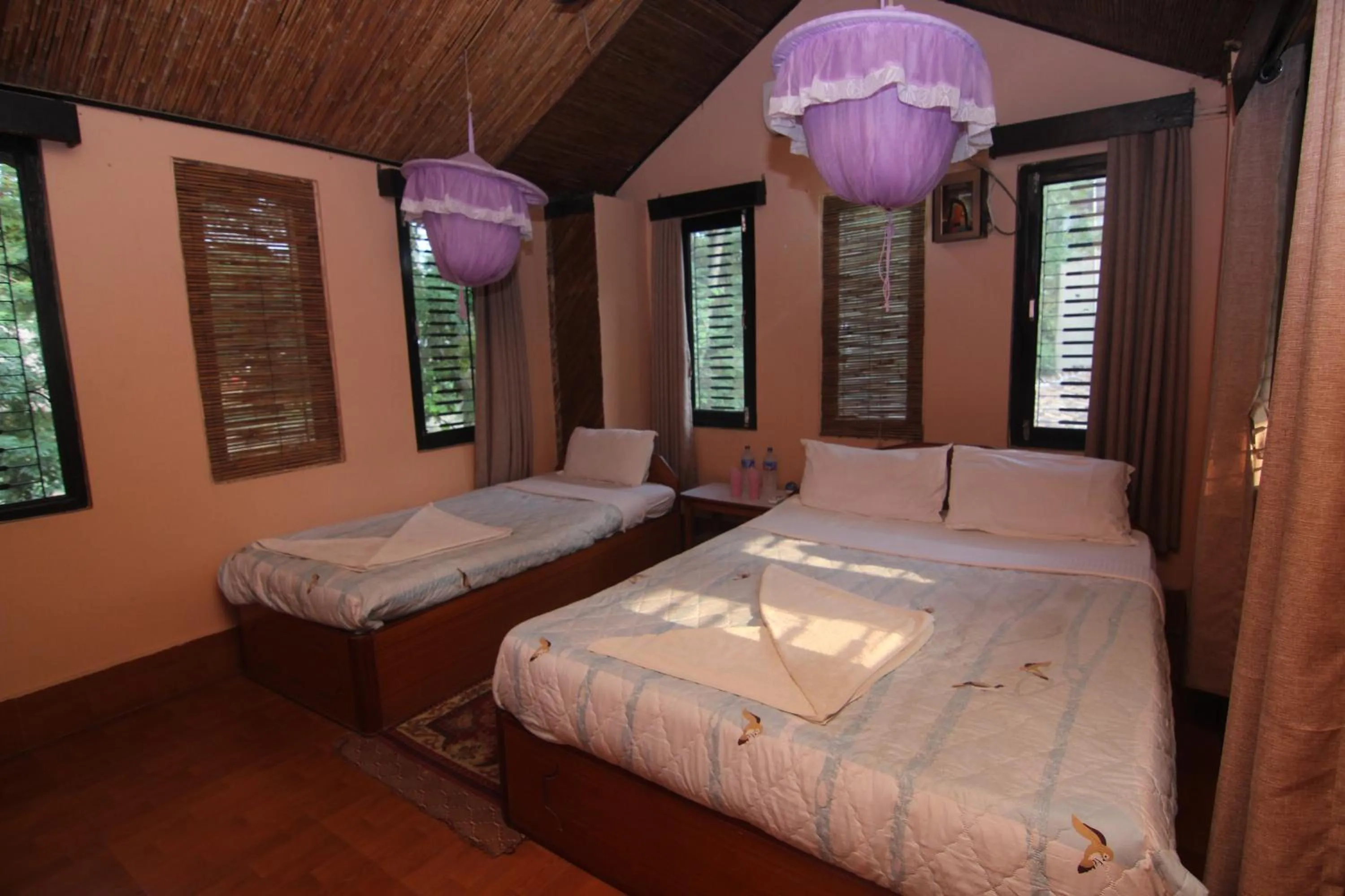 Bed in Chitwan Tiger Camp