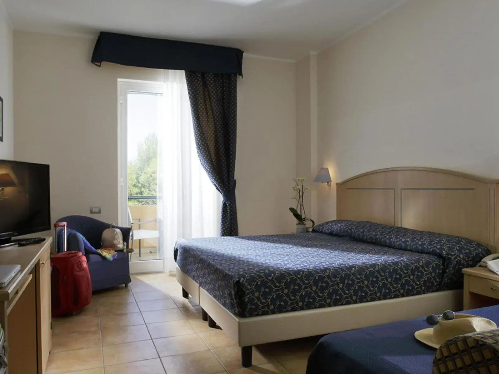 Standard Triple Room in Hotel I Melograni Standard Triple Room in Hotel I Melograni