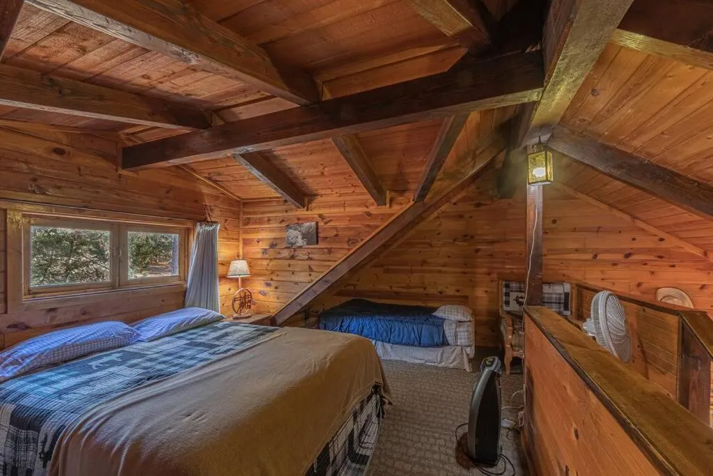 Bed in Forest Cabin 4 Cowboys Dream