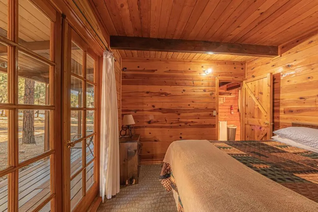 Bed in Forest Cabin 4 Cowboys Dream