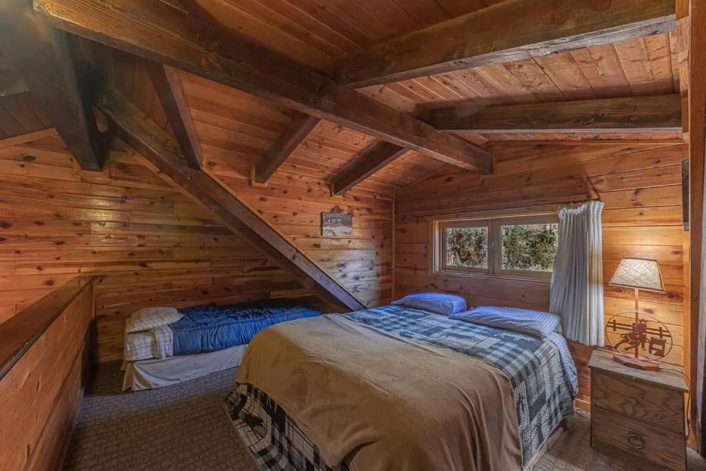 Bed in Forest Cabin 4 Cowboys Dream