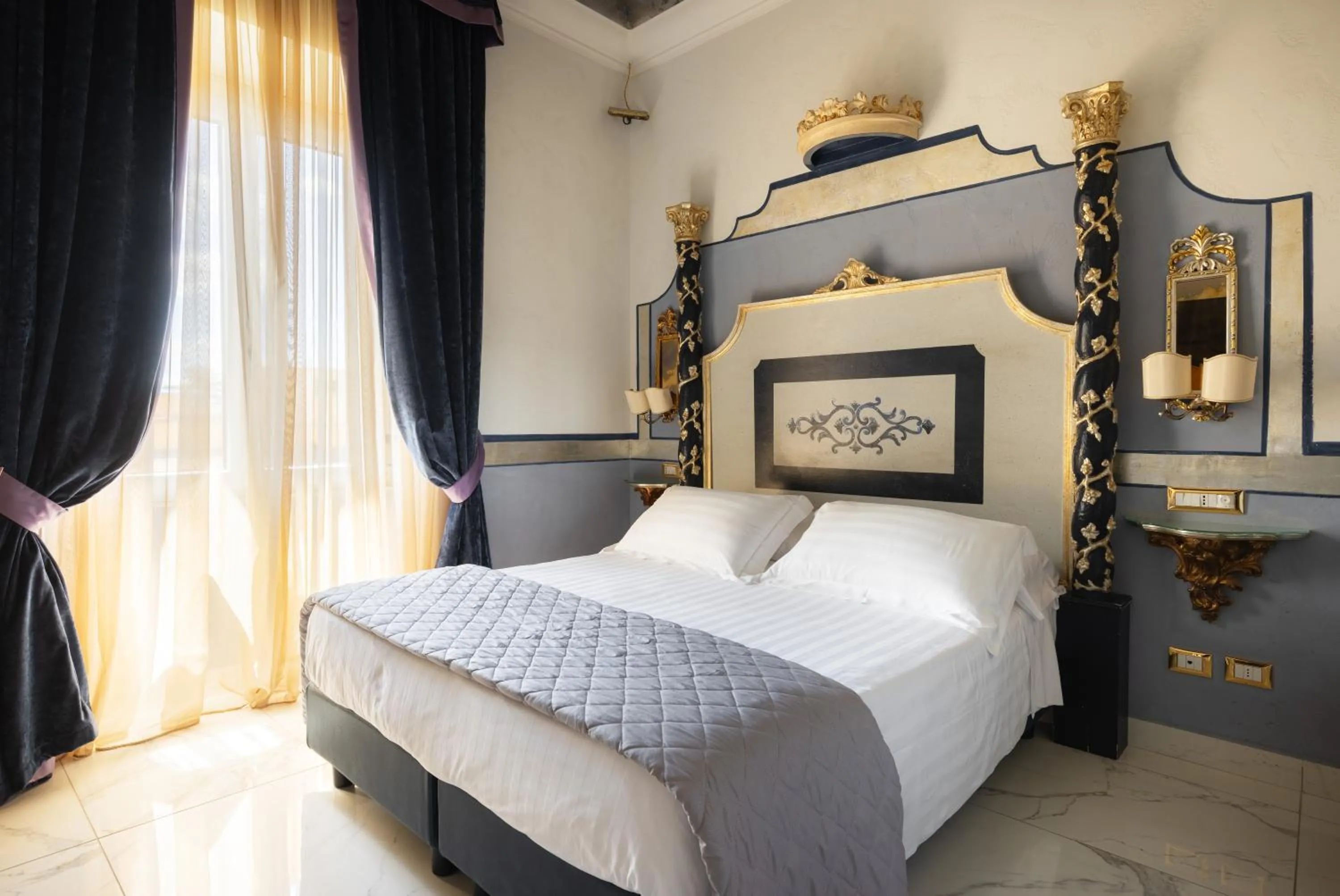 Bed in Romanico Palace Luxury Hotel & SPA