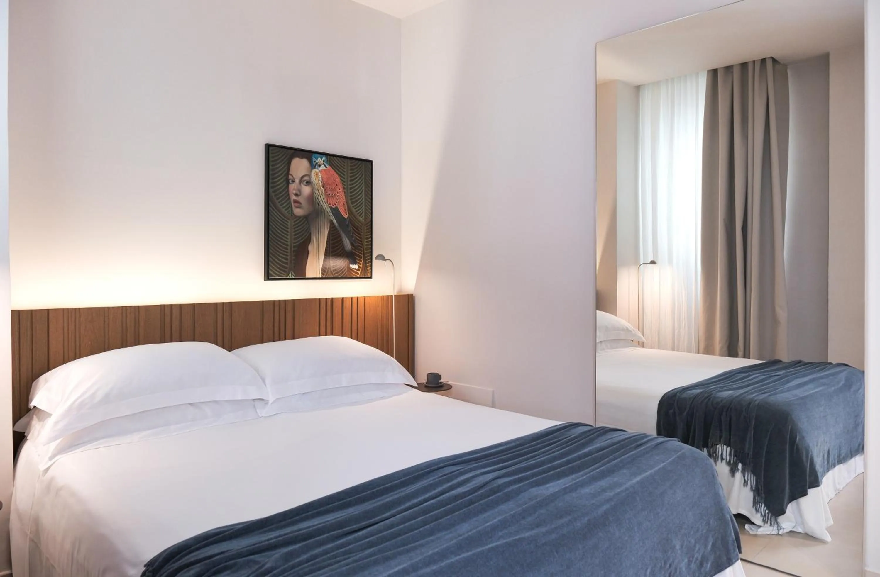 Bed in Taodomus Boutique Hotel