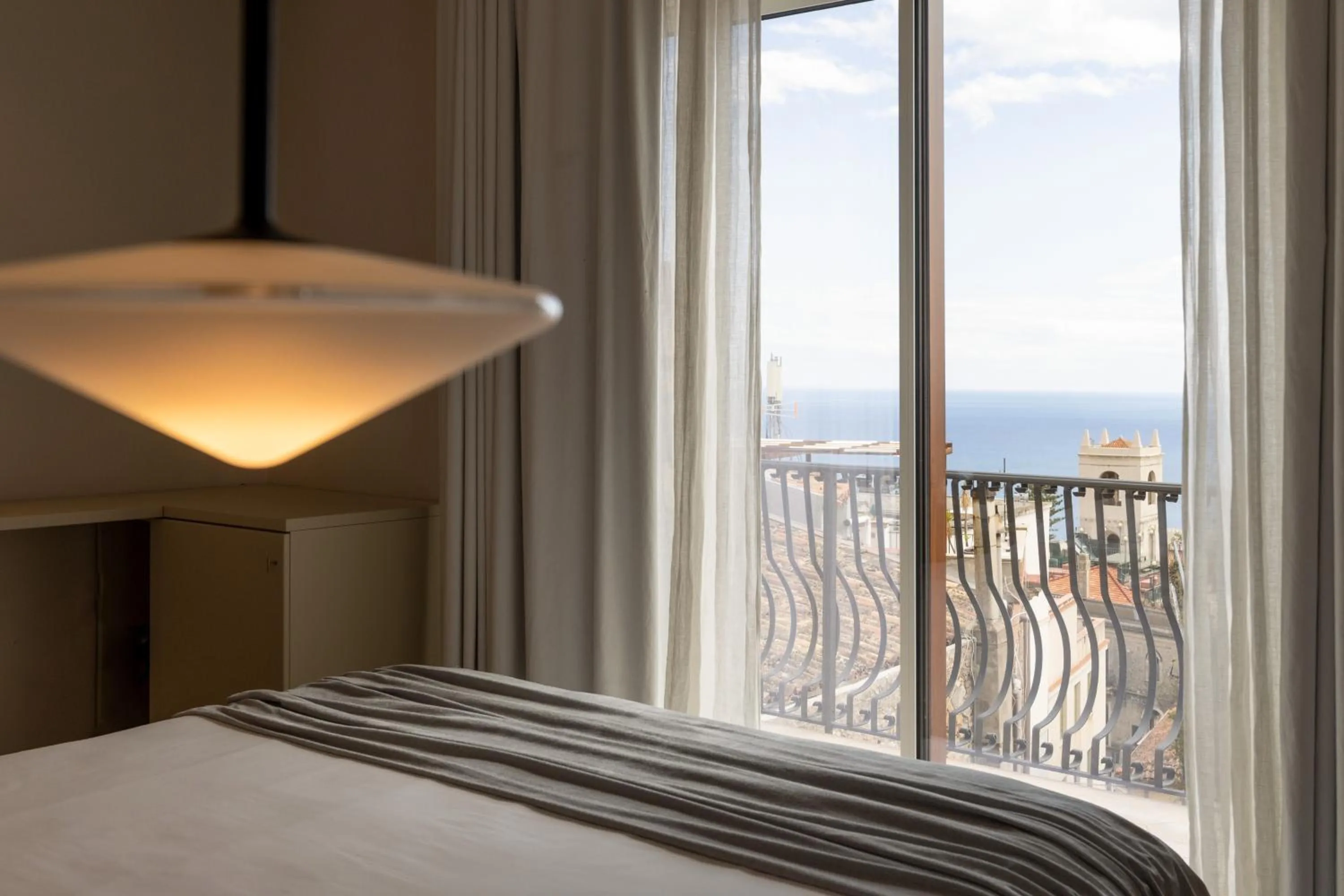 Bed in Taodomus Boutique Hotel