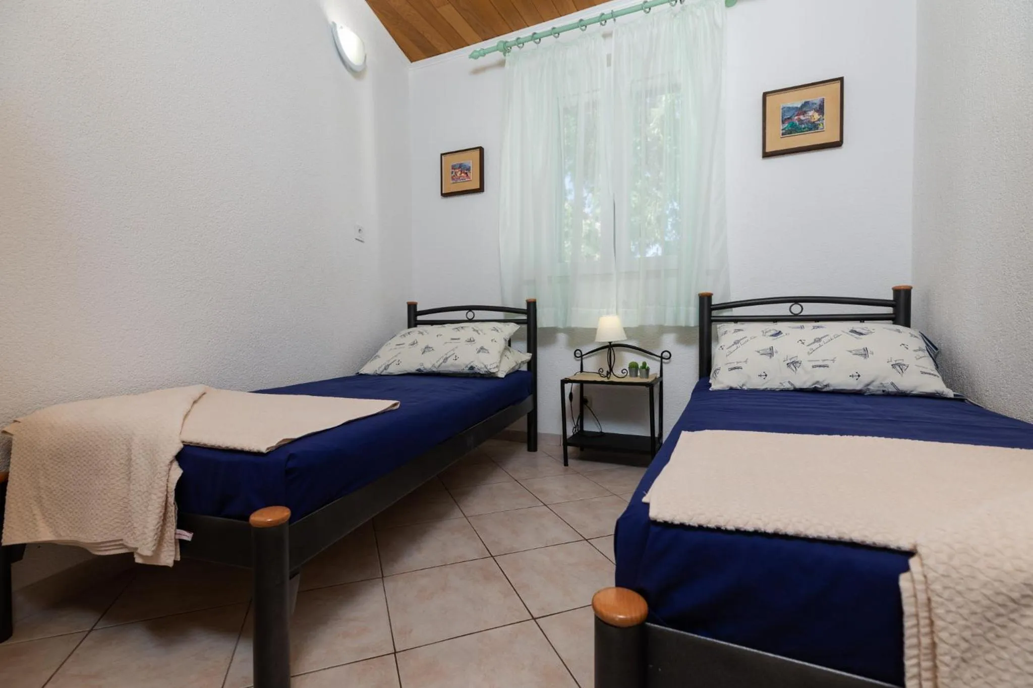 Bed in Apartments Paloc - Blue