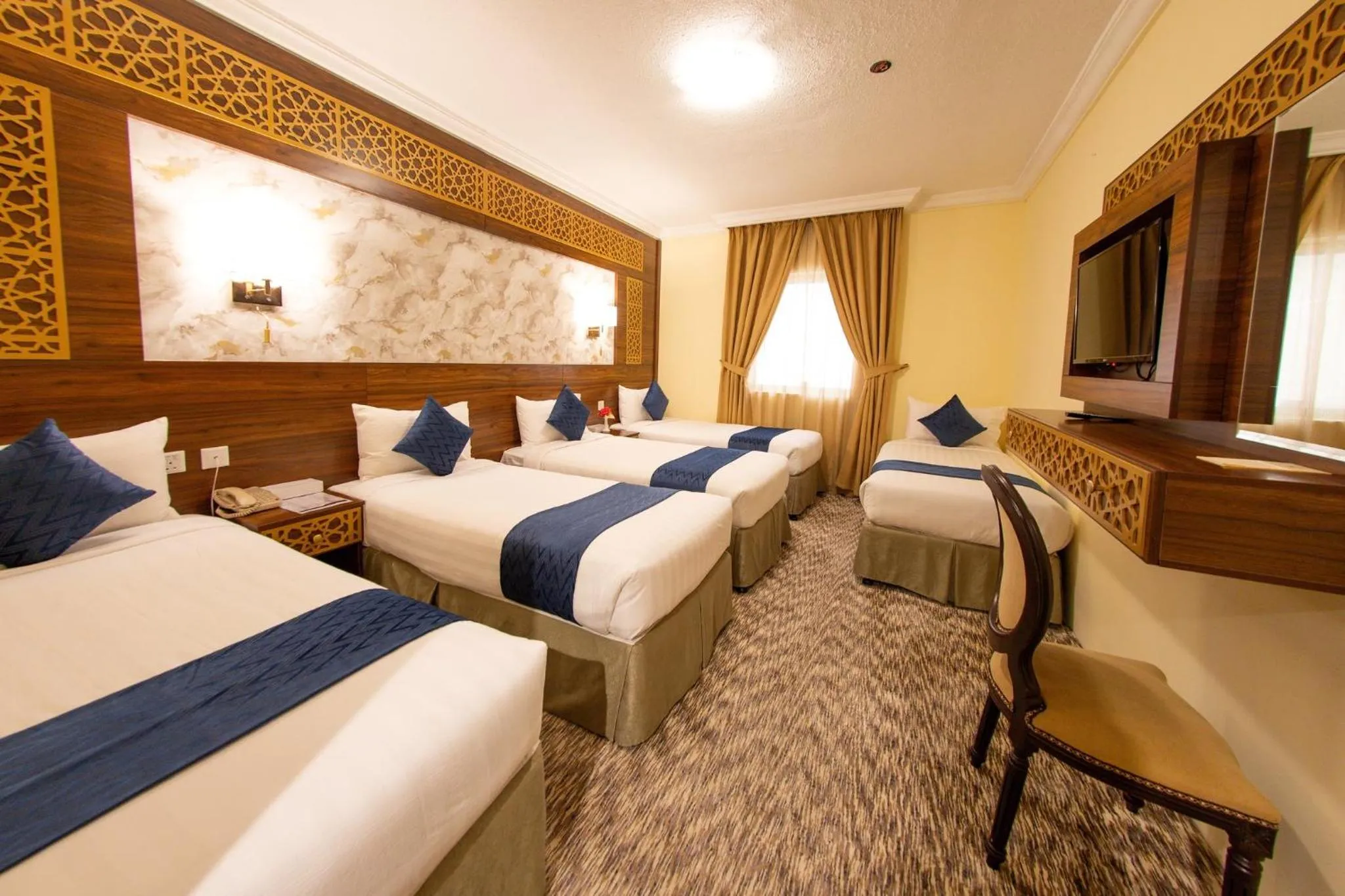 Photo of the whole room, Bed in Abraj Al Tayseer Tuwa Hotel