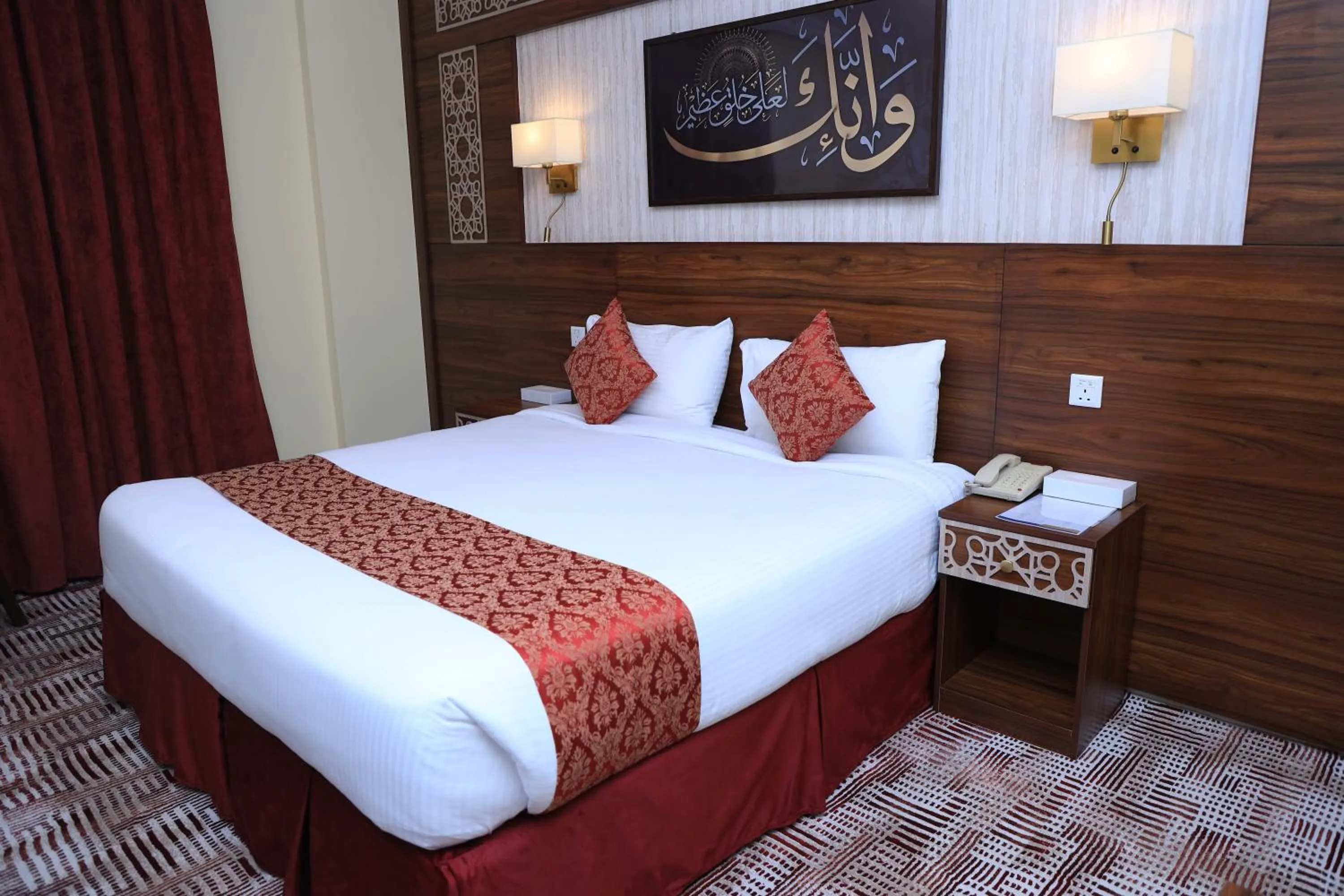 Bed in Abraj Al Tayseer Tuwa Hotel