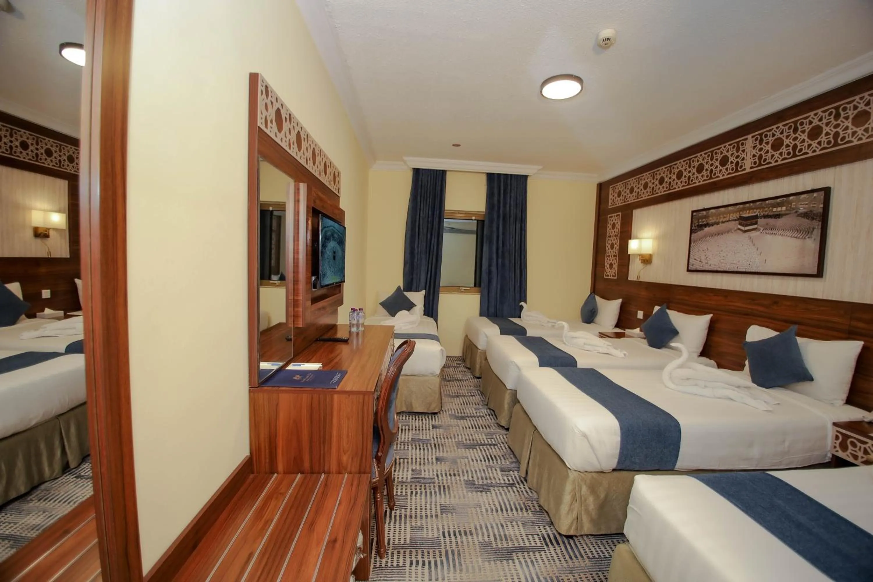 Bed in Abraj Al Tayseer Tuwa Hotel