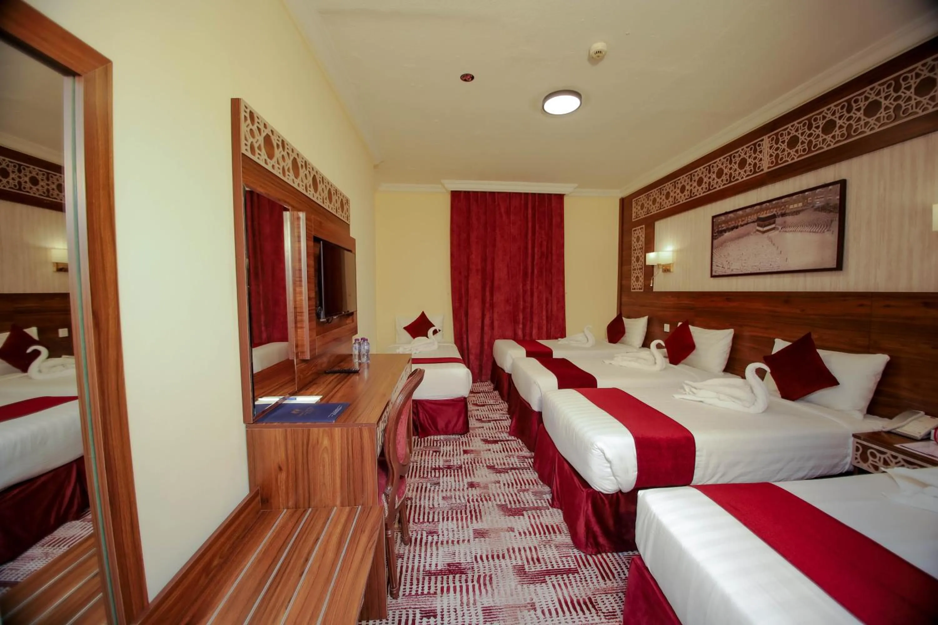 Bed in Abraj Al Tayseer Tuwa Hotel