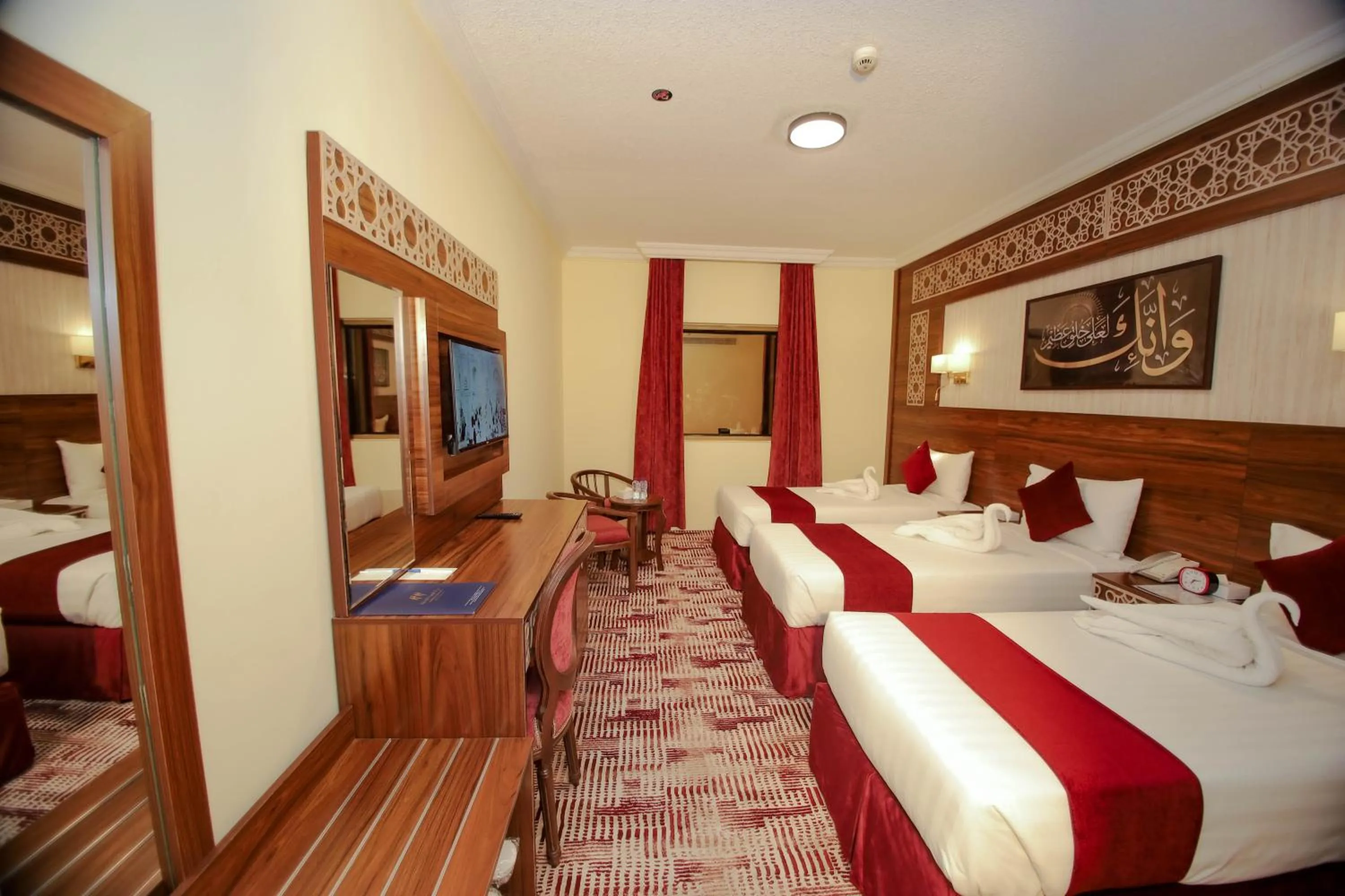 Bed in Abraj Al Tayseer Tuwa Hotel