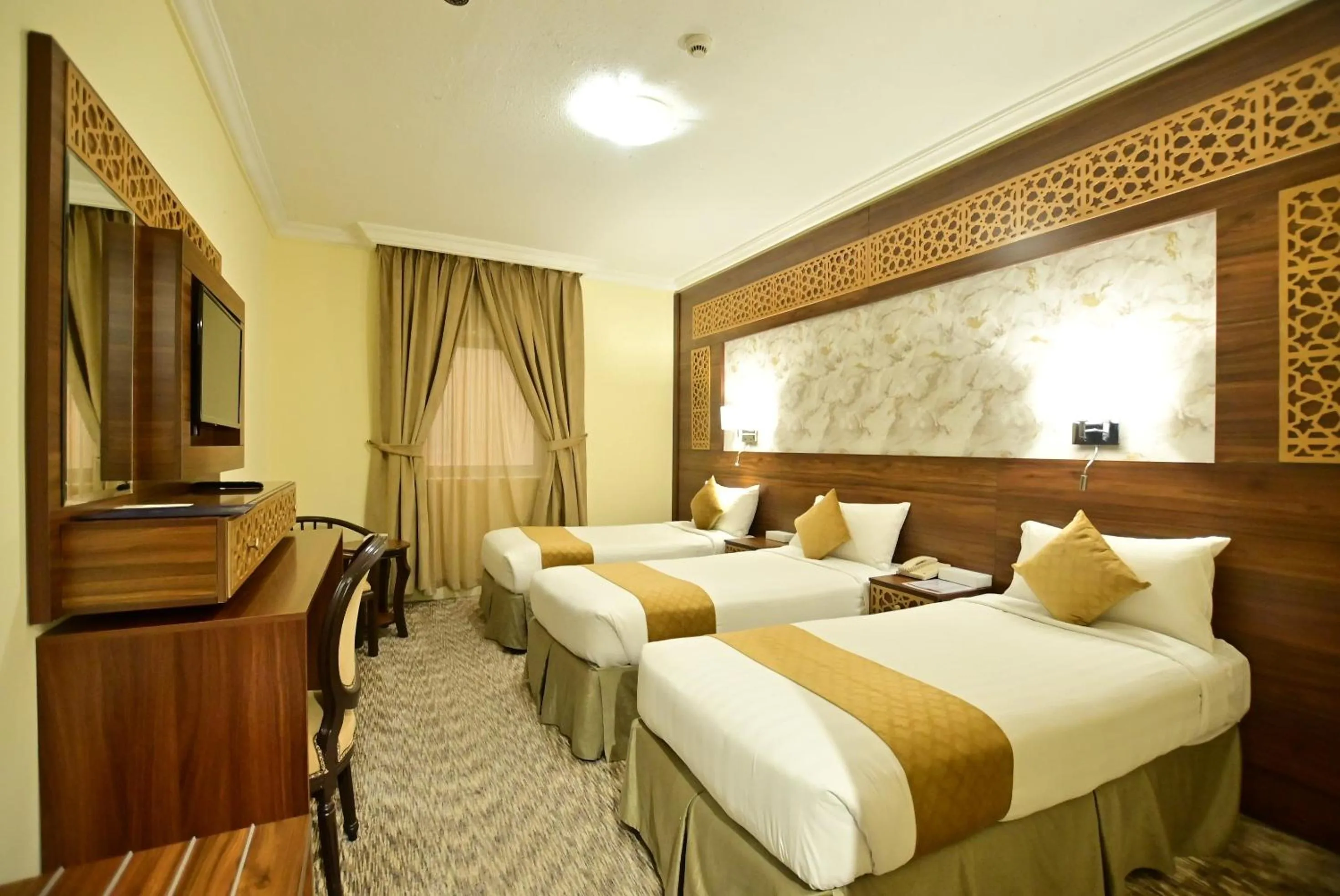 Photo of the whole room, Bed in Abraj Al Tayseer Tuwa Hotel