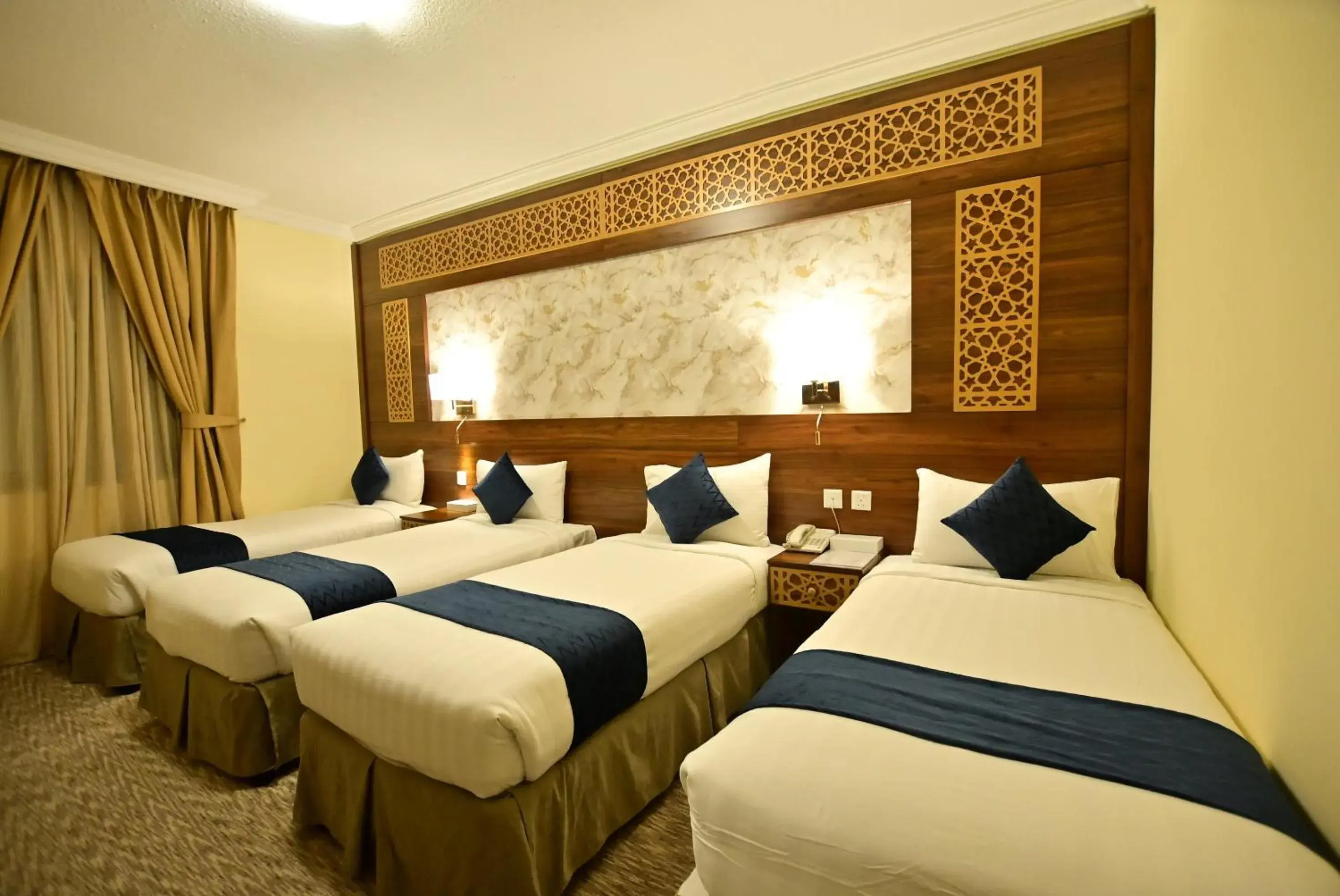 Premium Room with Four Single Beds - Accessible in Abraj Al Tayseer Tuwa Hotel Premium Room with Four Single Beds - Accessible in Abraj Al Tayseer Tuwa Hotel