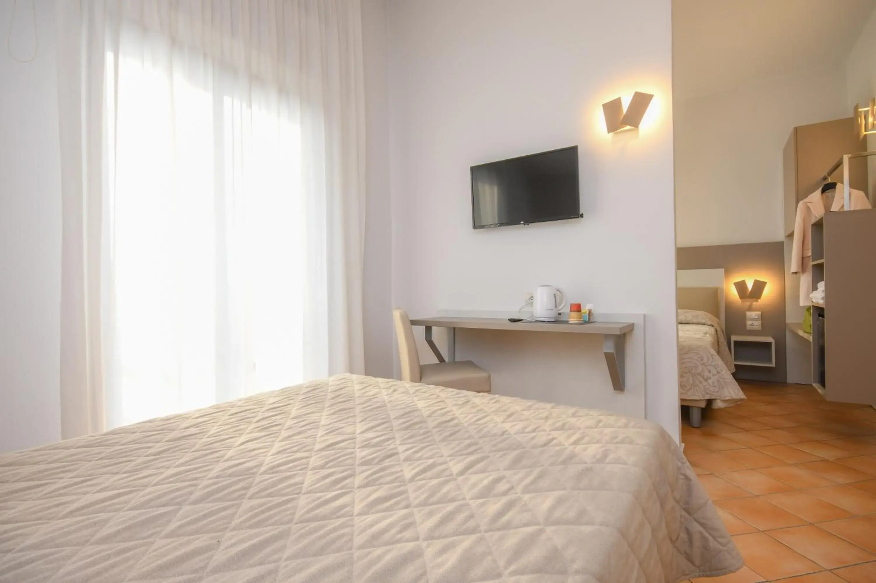 Quadruple Room in Hotel Riel Quadruple Room in Hotel Riel