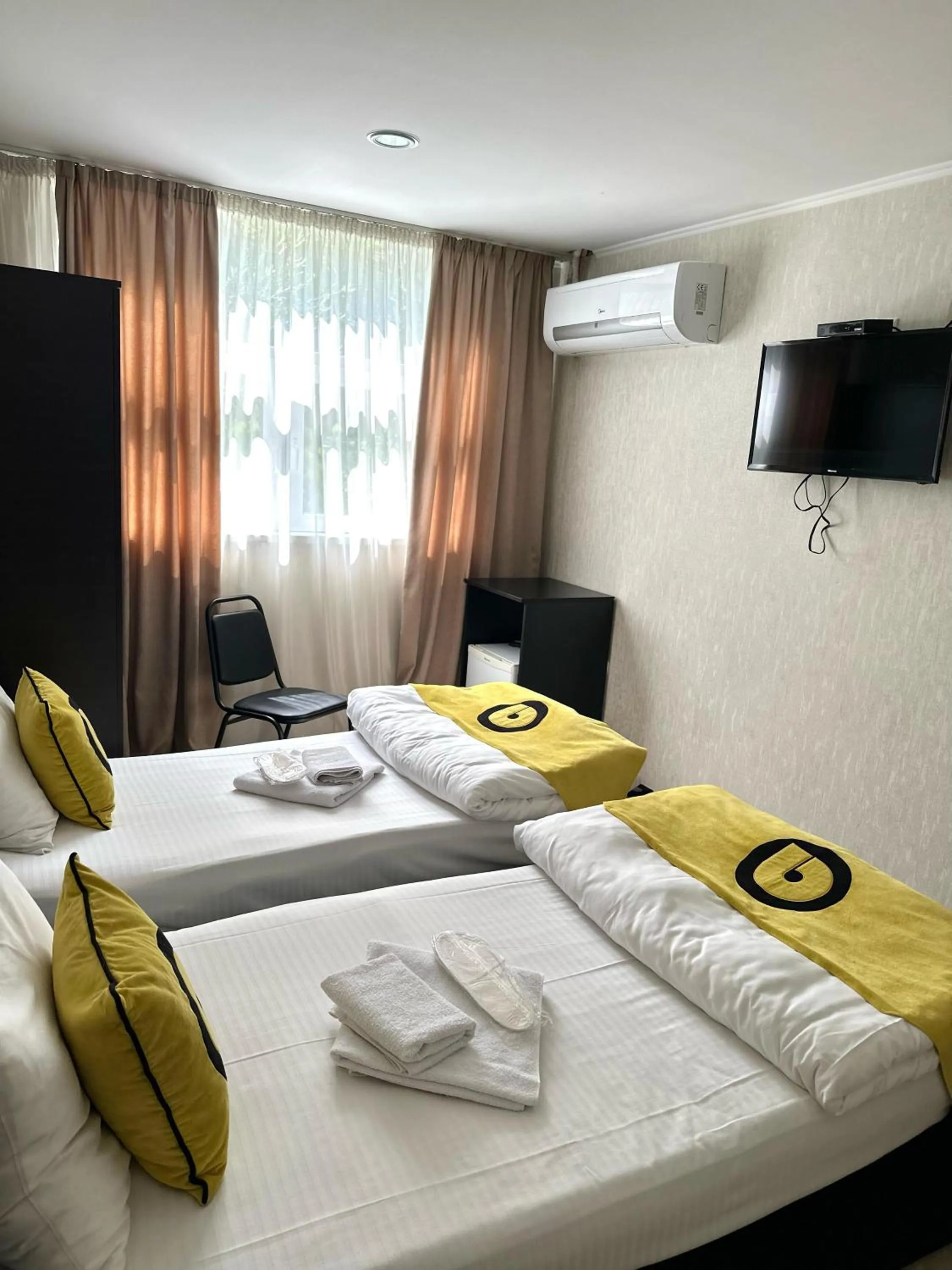 Bed in Hotel Aira Plaza